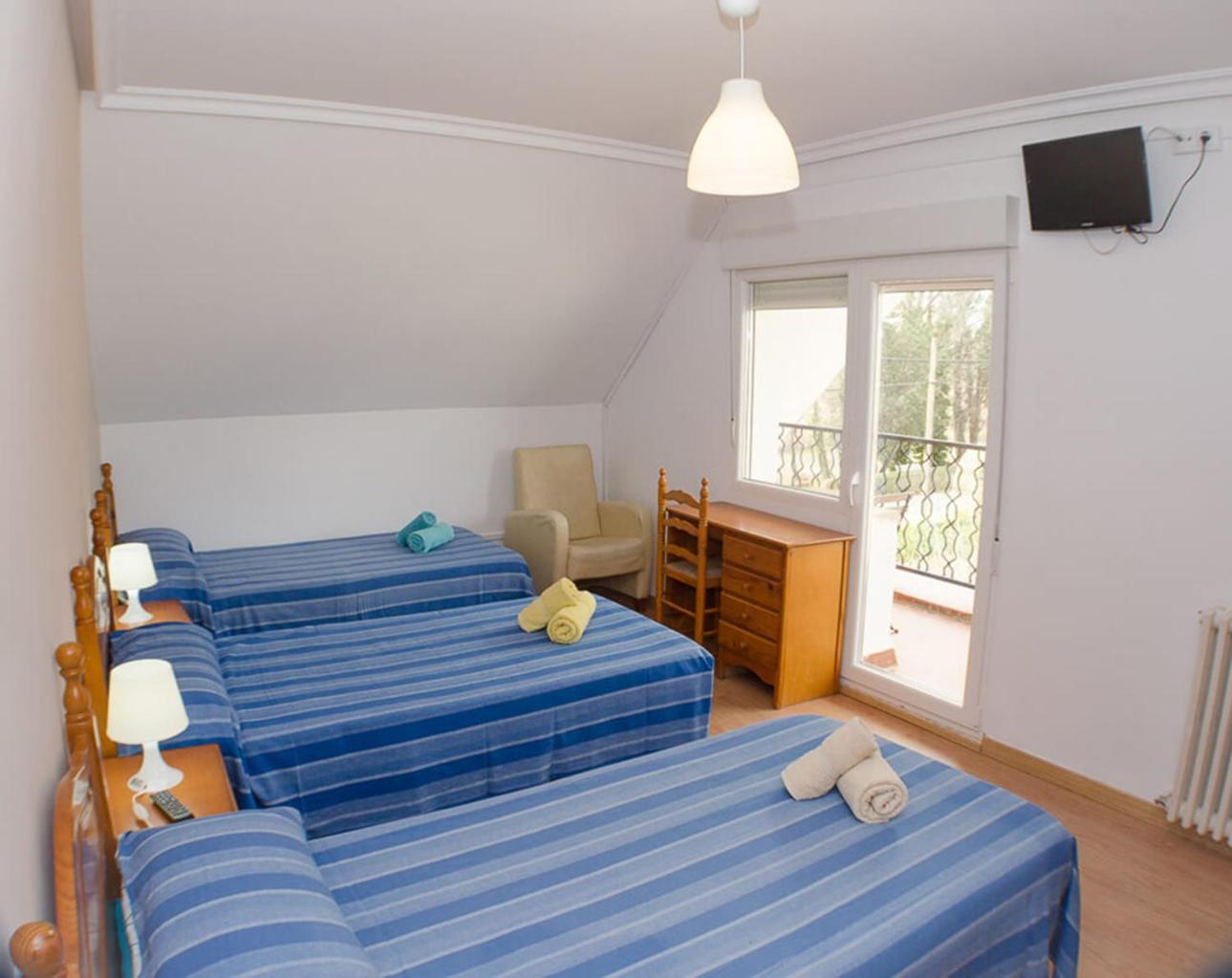 Habitación Triple con Baño Privado