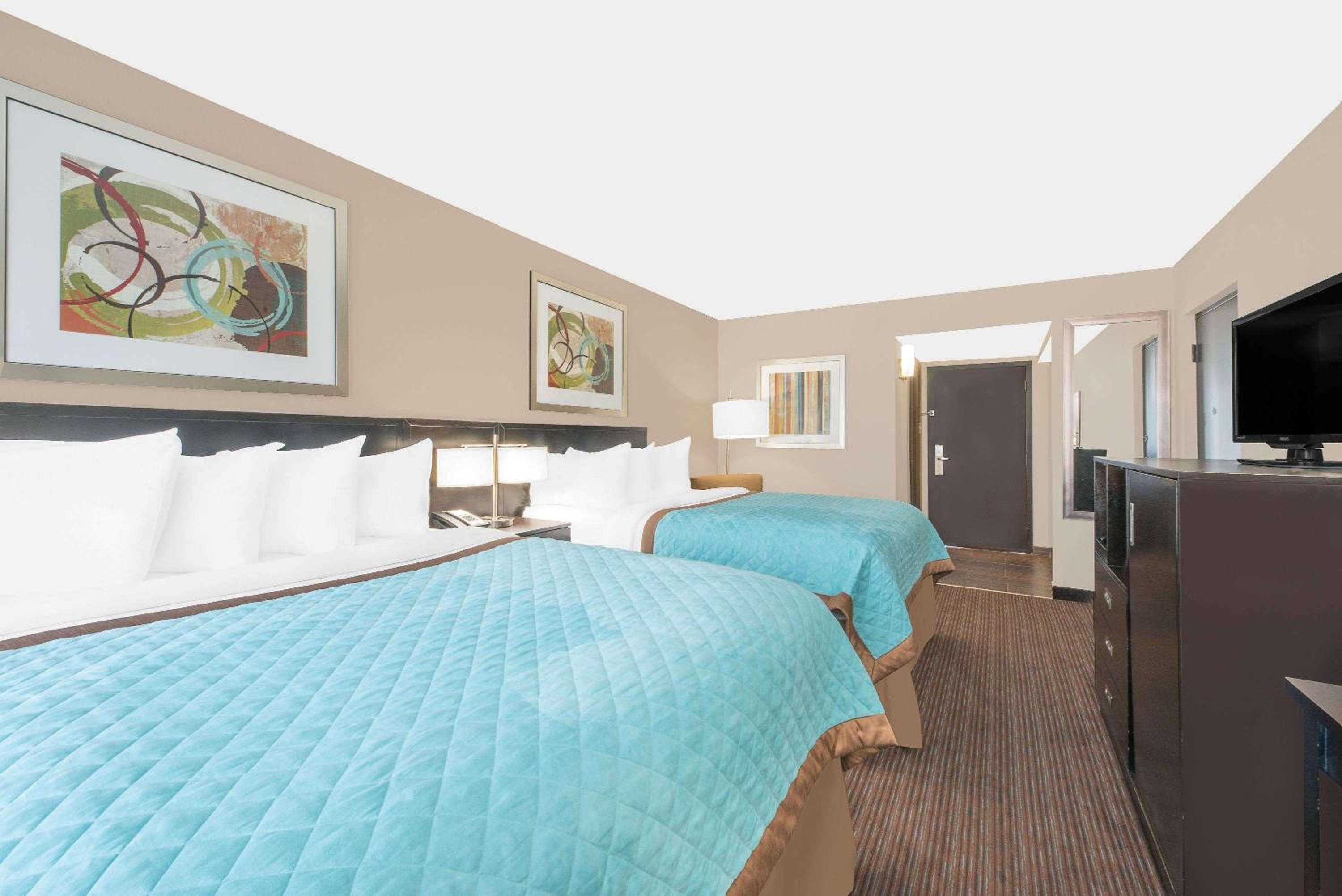 Queen Room with Two Queen Beds - Photo 1