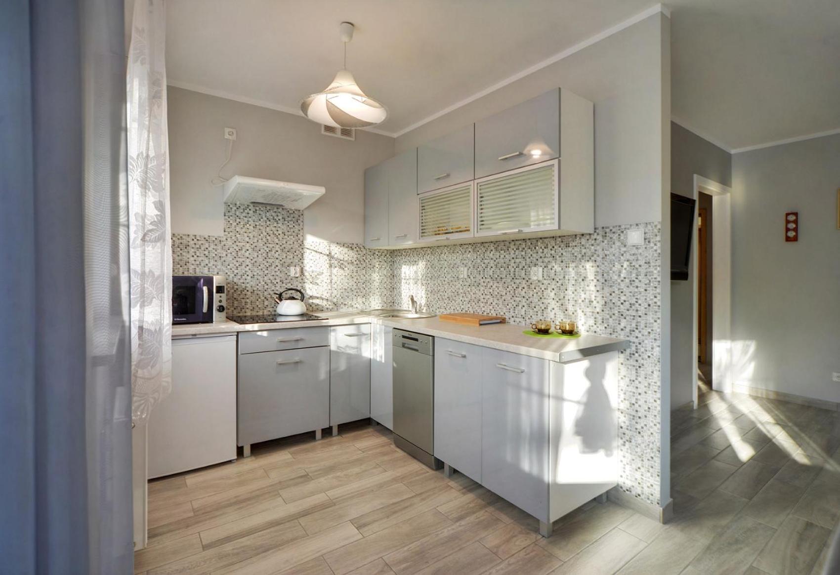 Apartment with Balcony - Photo 13