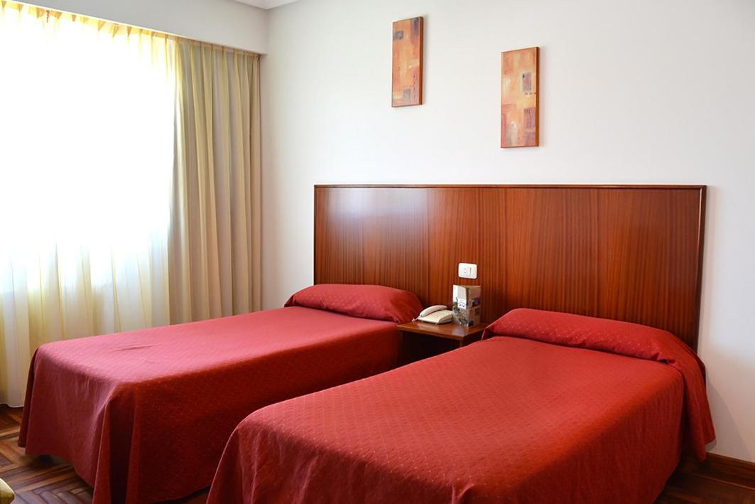 Twin Room - Photo 1