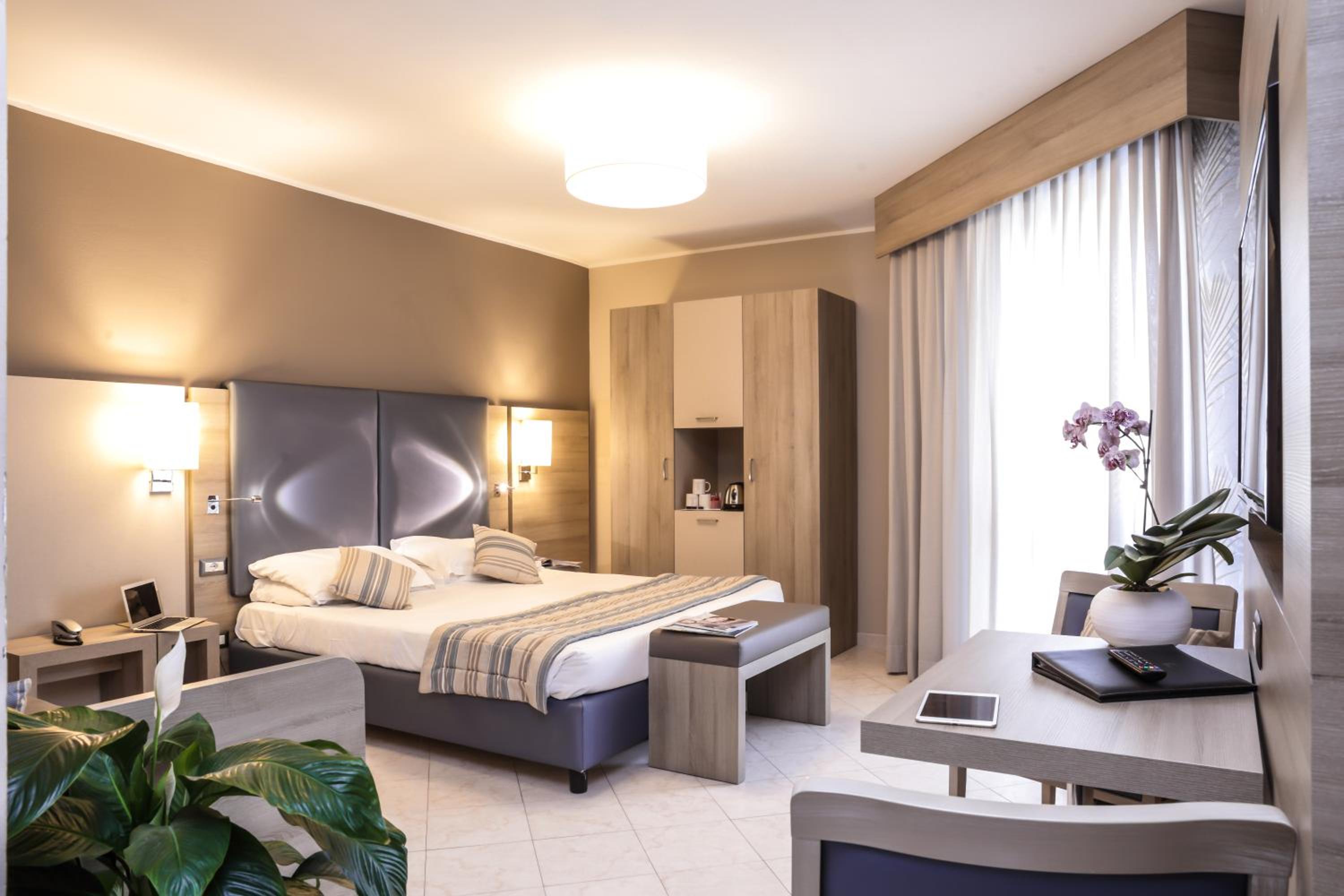 Quadruple Room with Balcony - Photo 1
