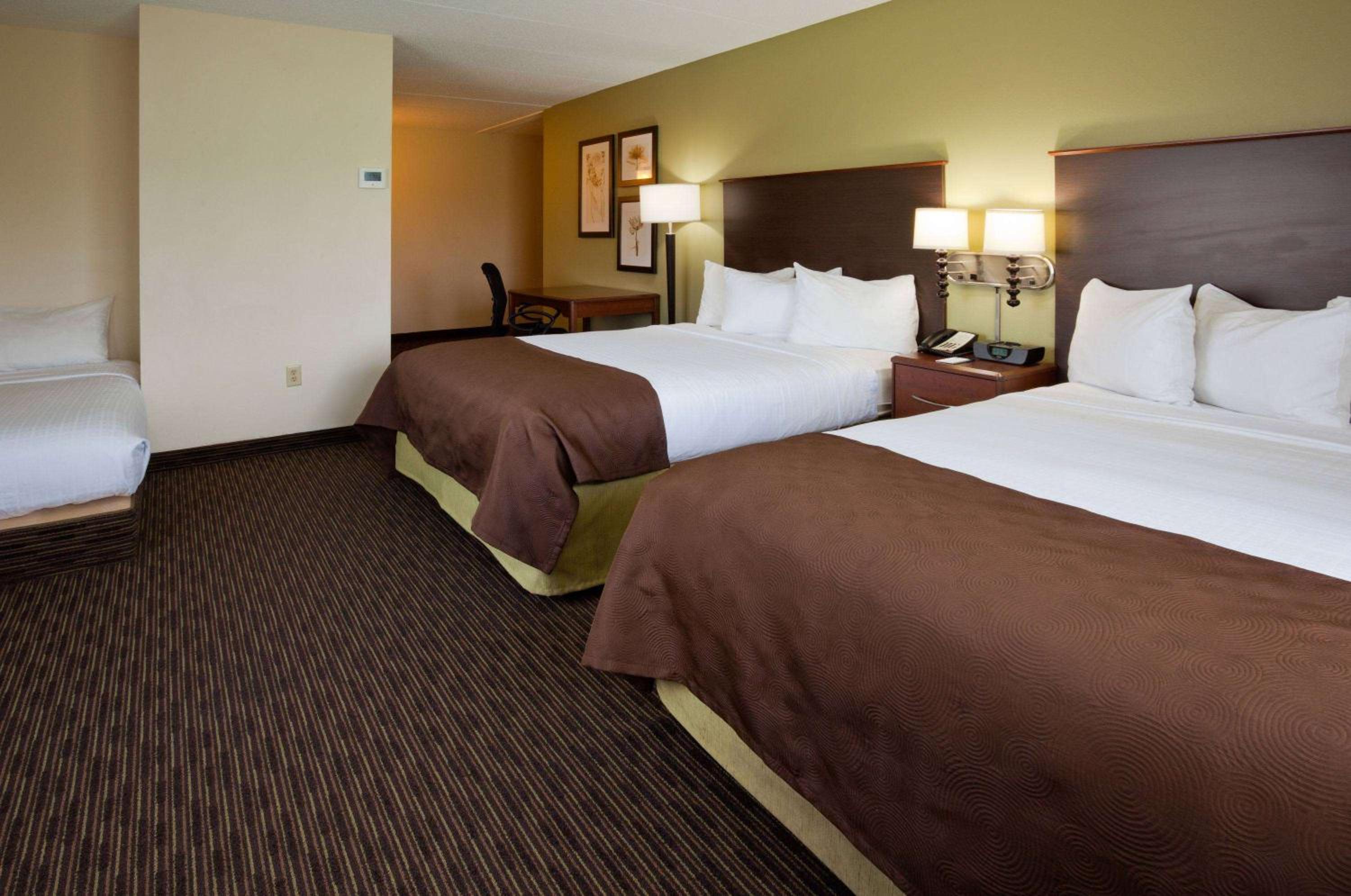 Studio Suite with Two Queen Beds and One Twin Bed - Non-Smoking photo 1