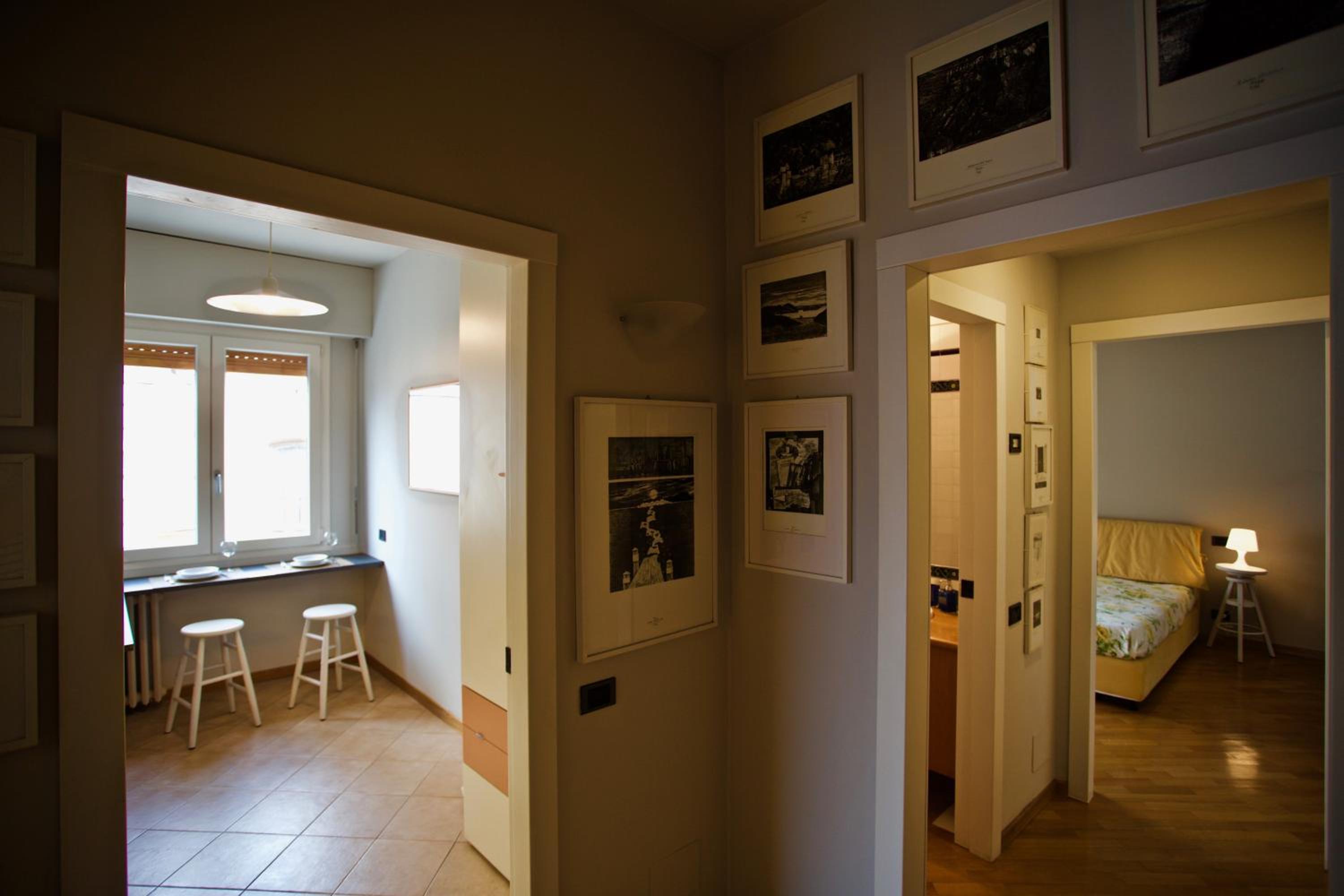 One-Bedroom Apartment with Balcony and City View - Photo 19