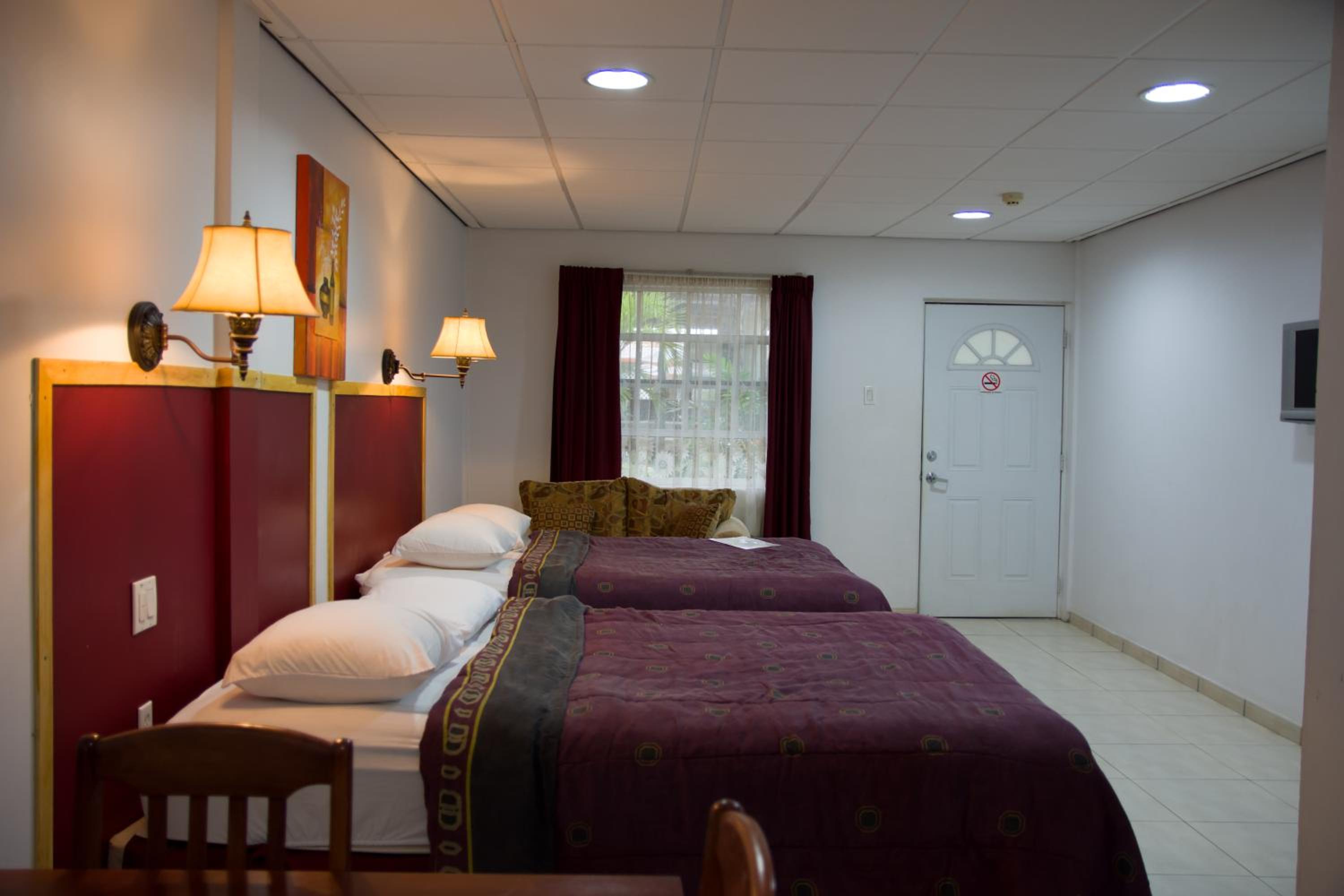 Deluxe Queen Room with Two Queen Beds photo 2