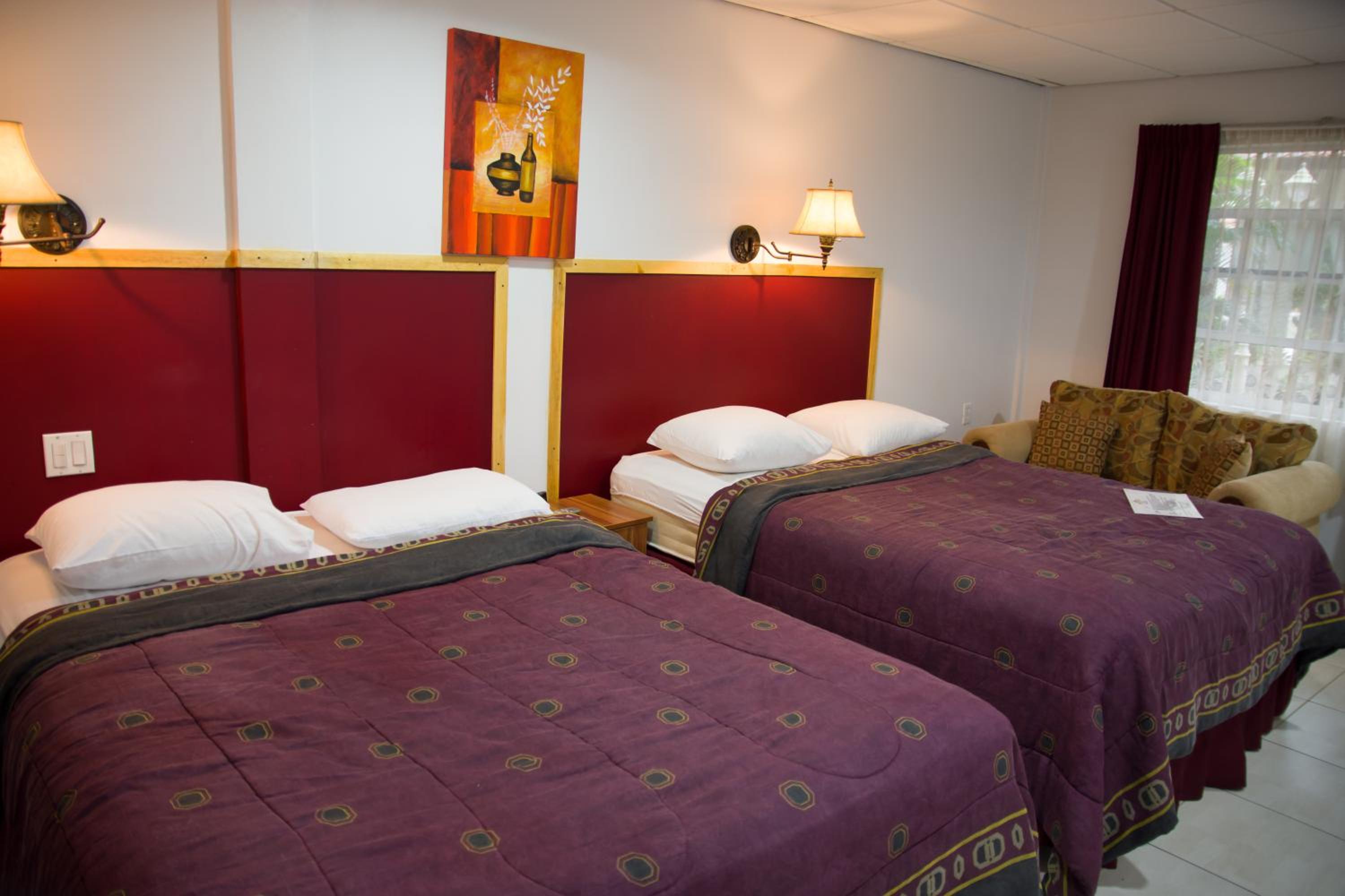 Deluxe Queen Room with Two Queen Beds photo 1