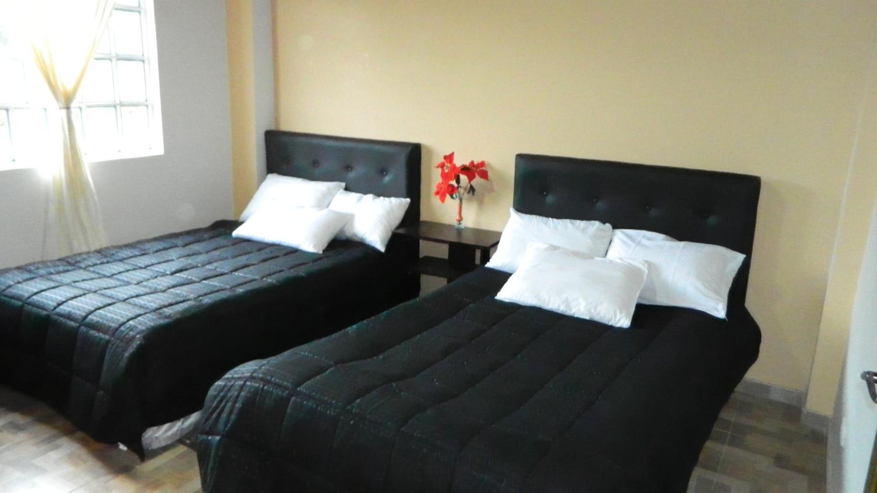 Quadruple Room with Private Bathroom photo 1