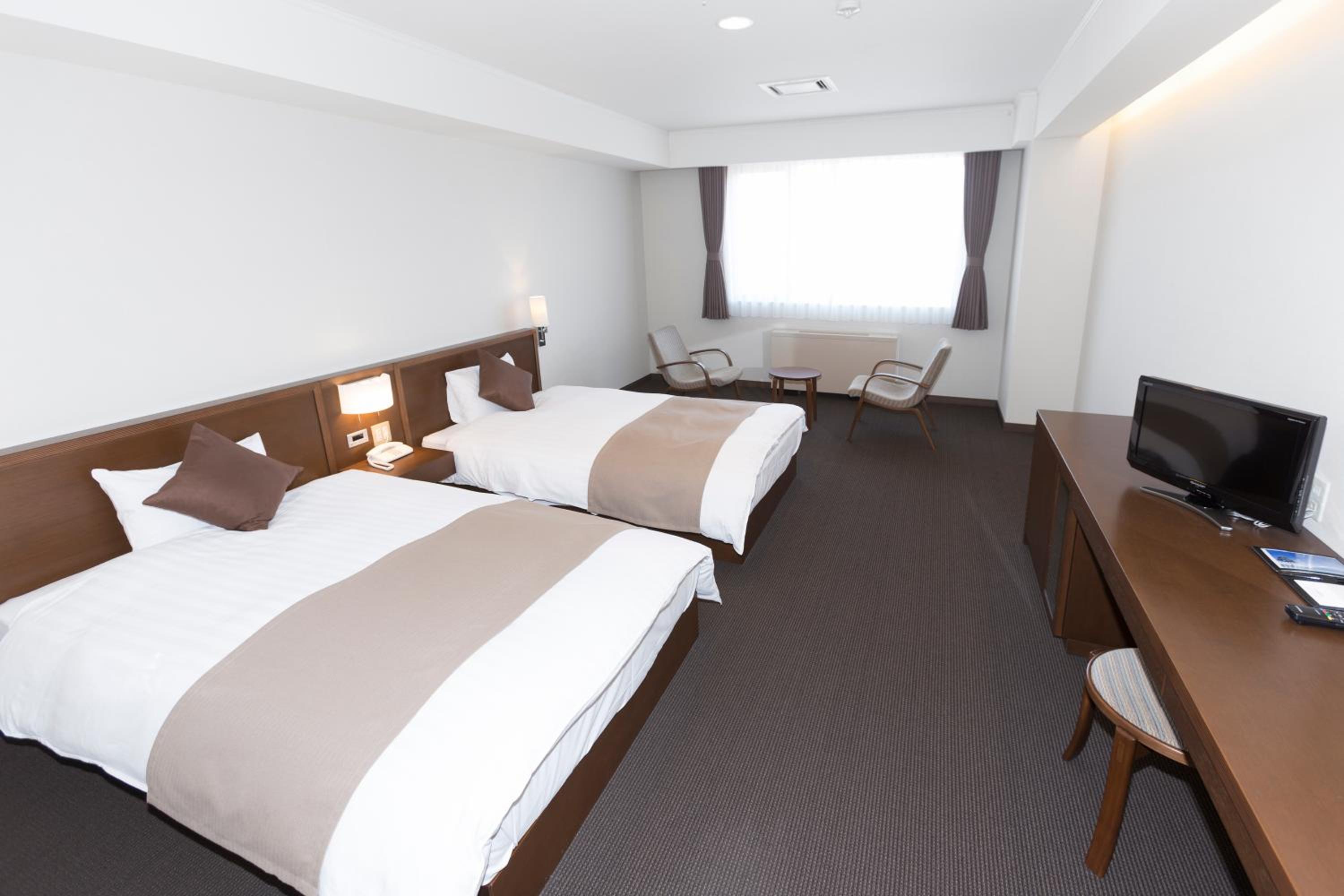 Twin Room - Non-Smoking - Photo 1