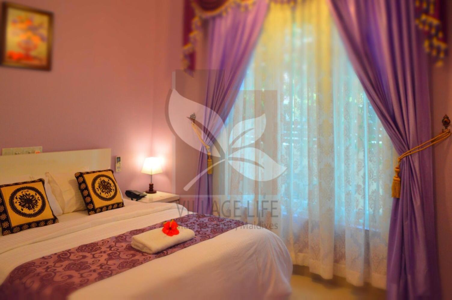 Deluxe Double Room (2 Adults + 1 Child)