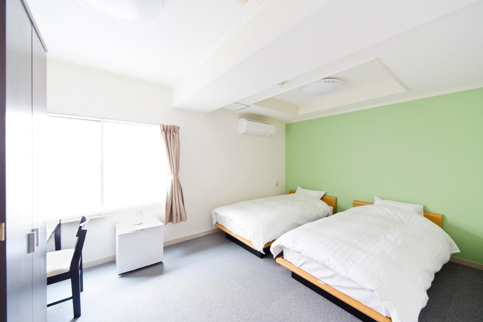 Deluxe Twin Room with Extra Bed photo 2