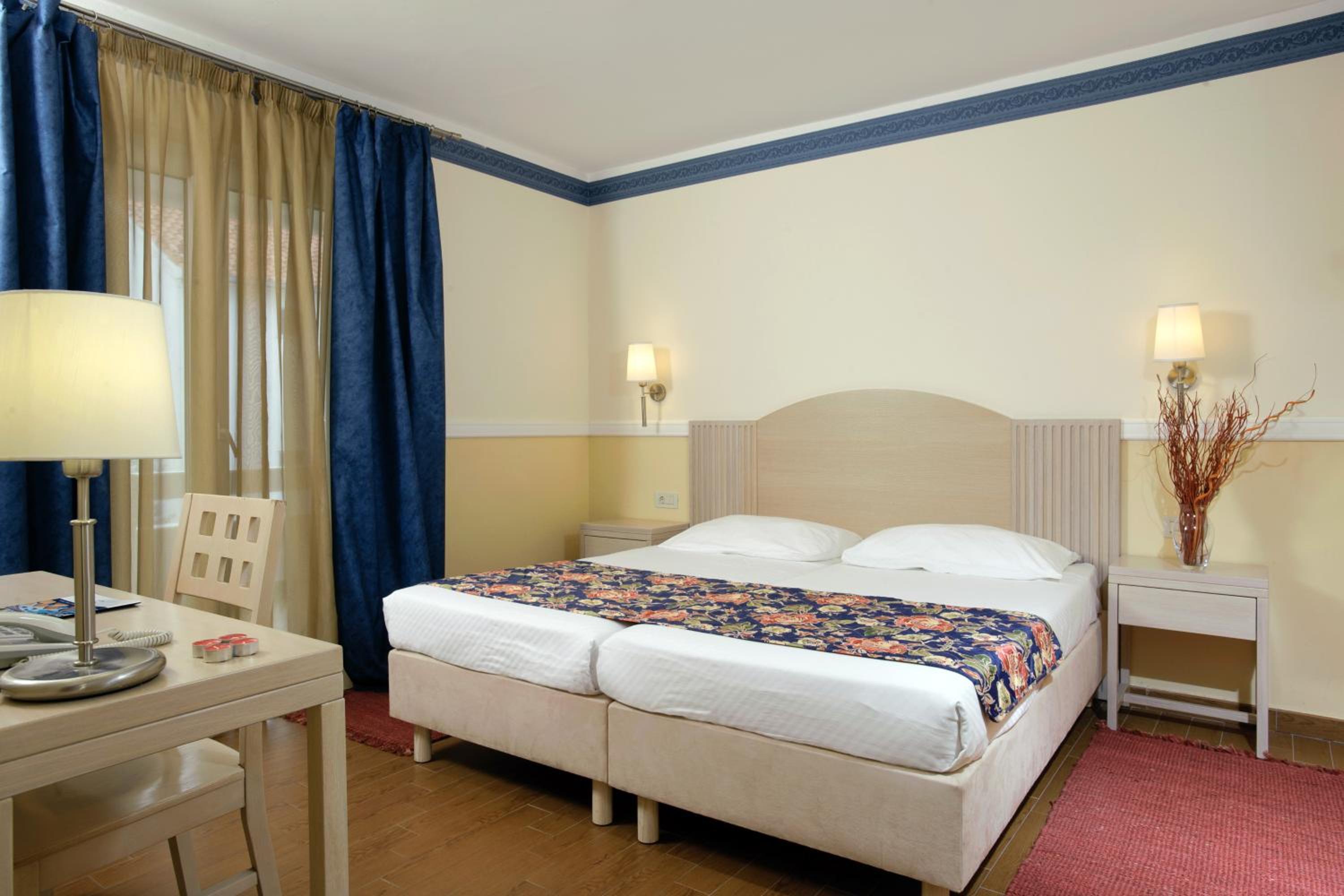One-Bedroom Apartment with Balcony (2 Adults + 2 Children)