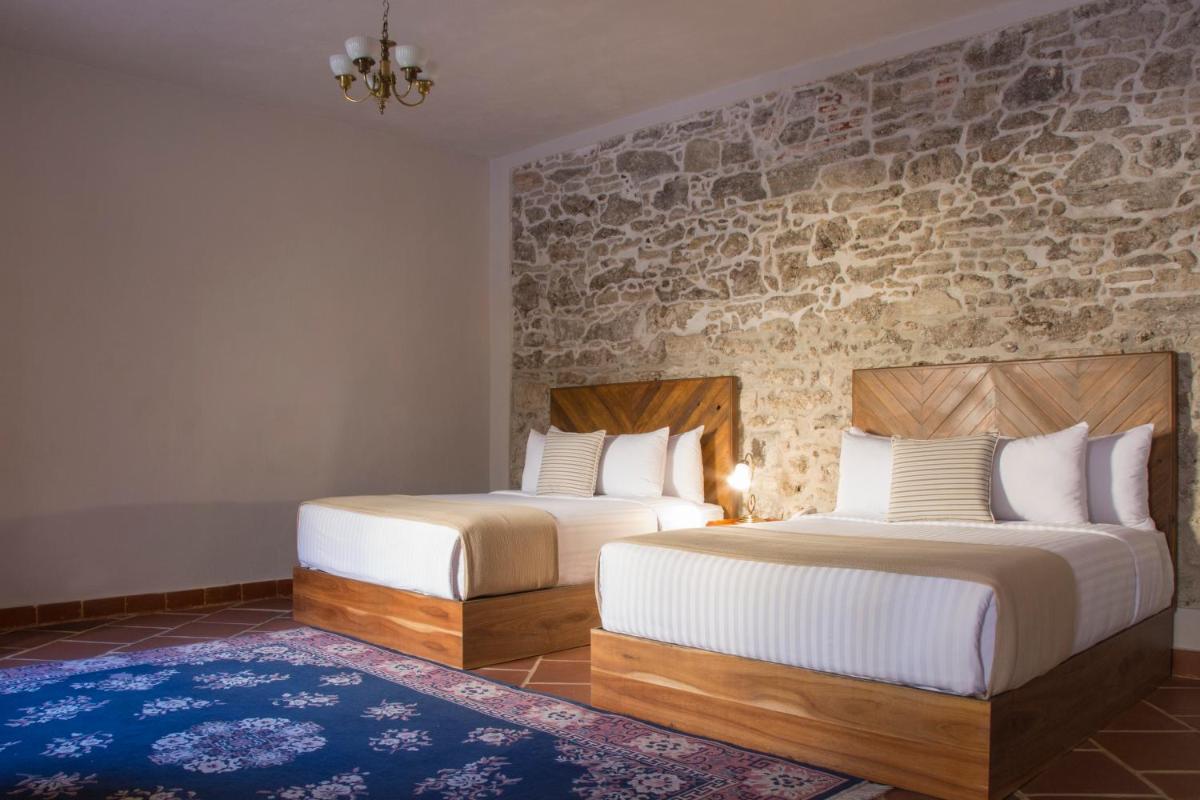 Suite Queen Room with Two Queen Beds photo 1