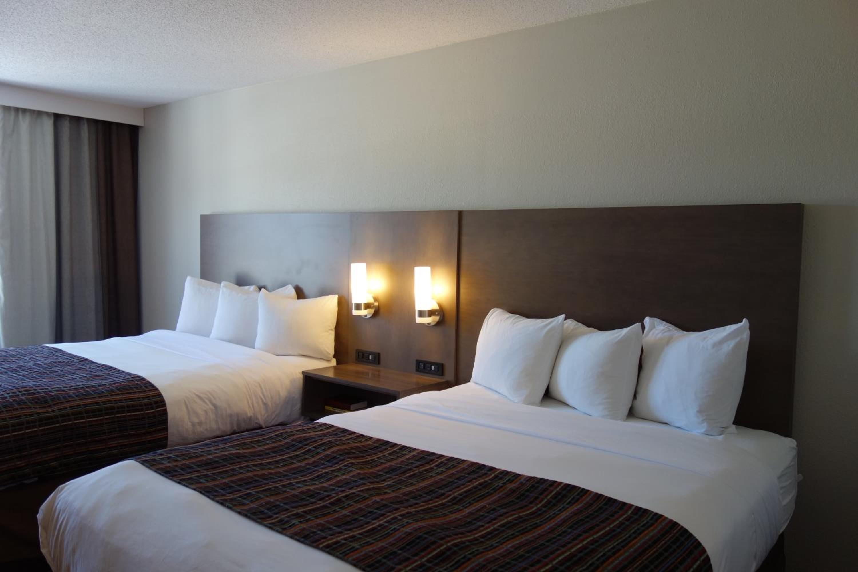Queen Room with Two Queen Beds - Photo 1
