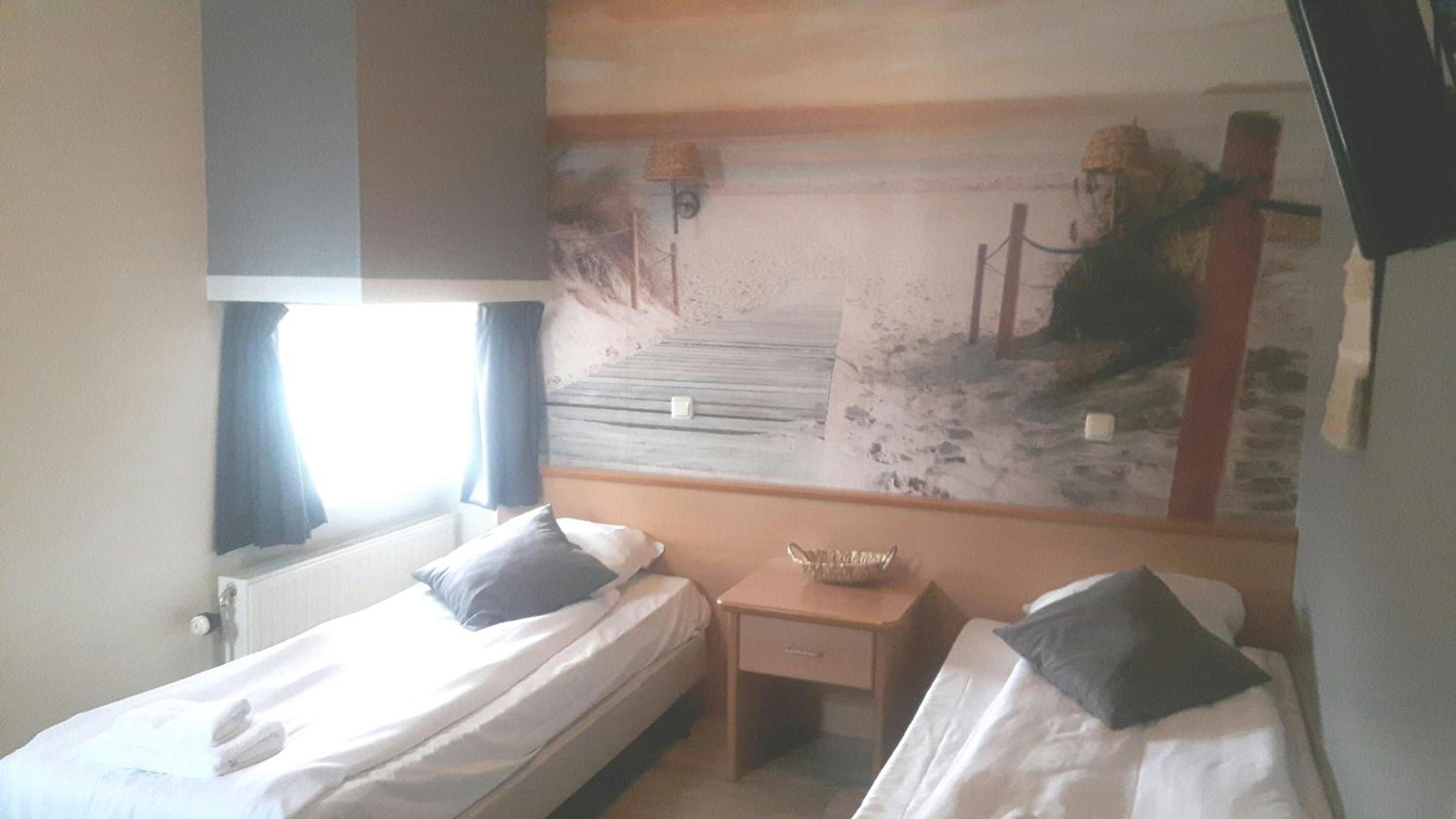 Triple Room with Private Bathroom - Photo 1