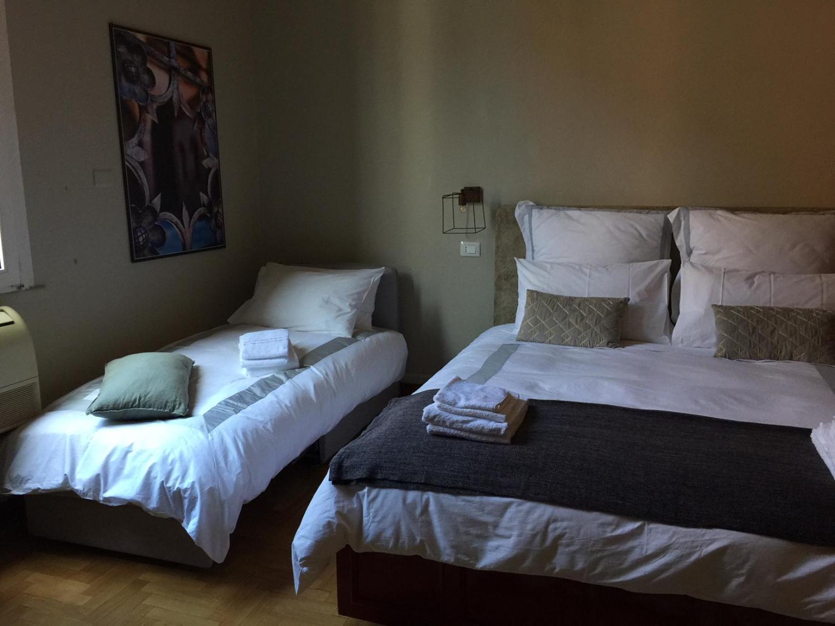 Deluxe Quadruple Room - Photo 26