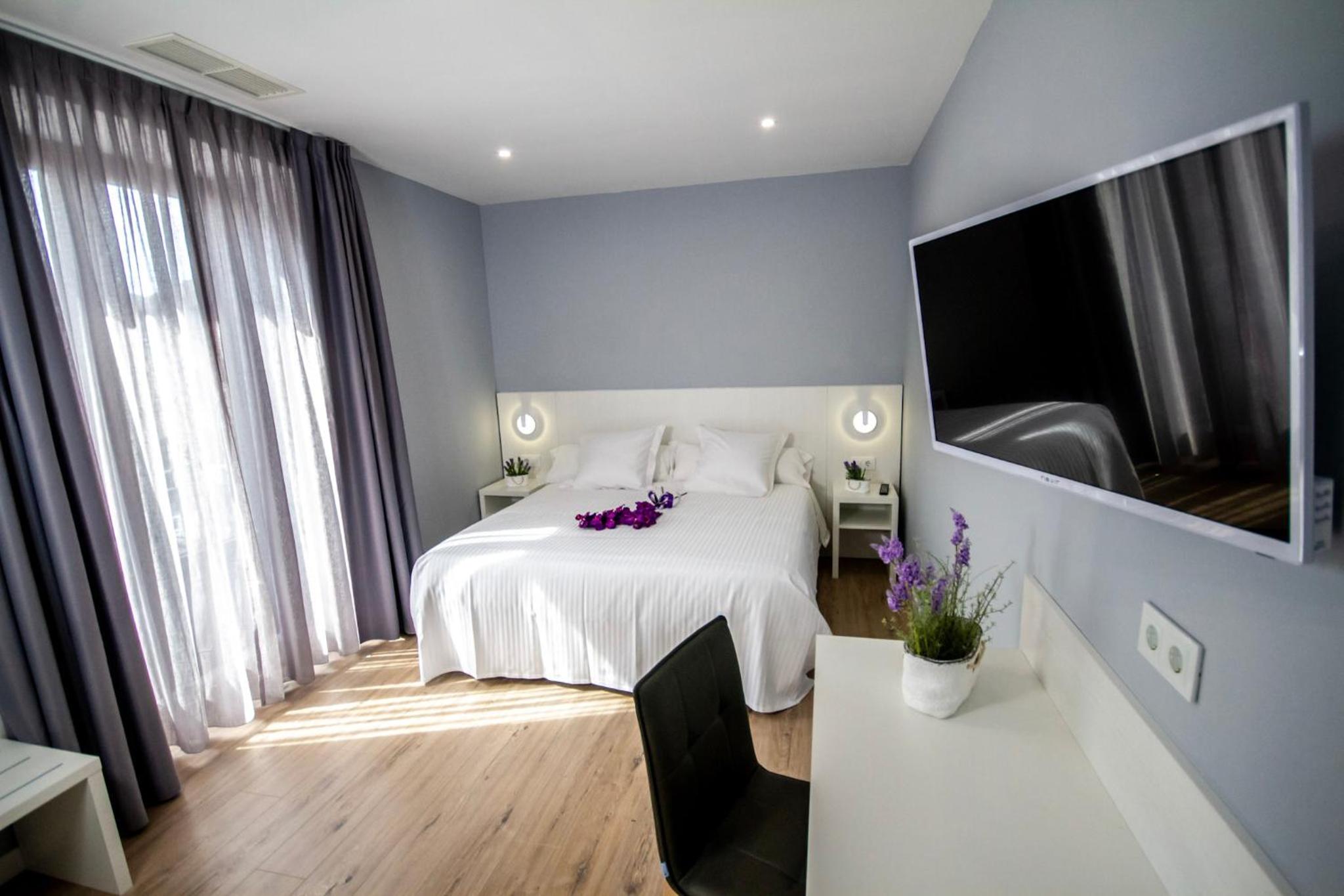 Habitación King con Balcón