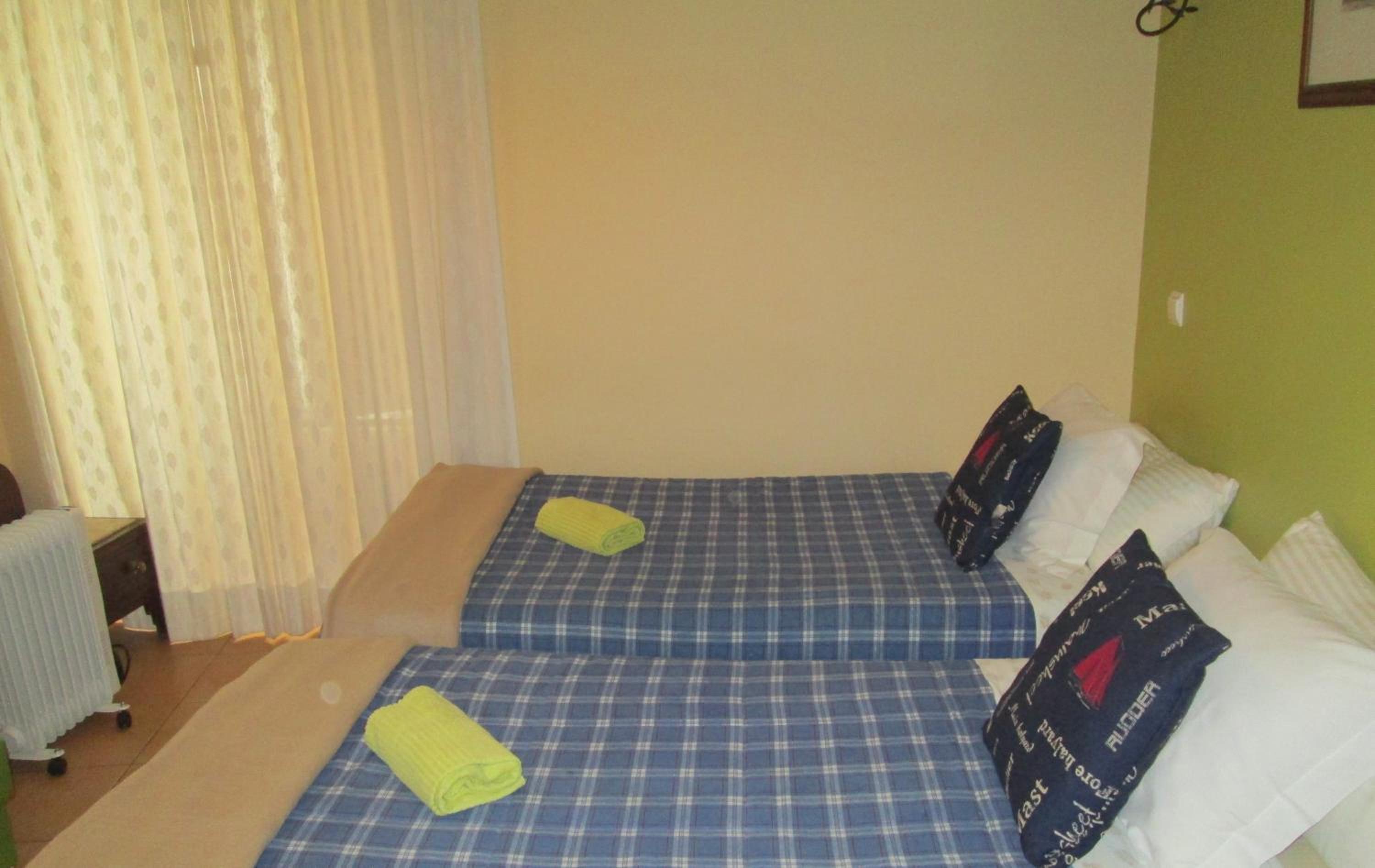 Twin Room with Shared Bathroom photo 1