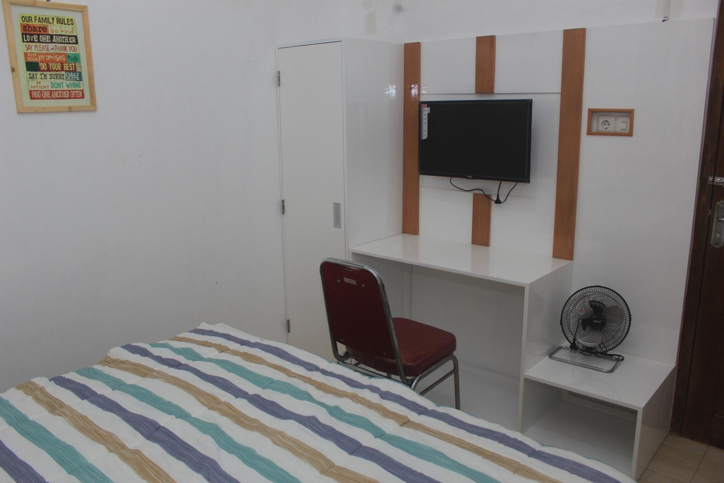 Deluxe Room (2 Adults + 1 Child) - Photo 5