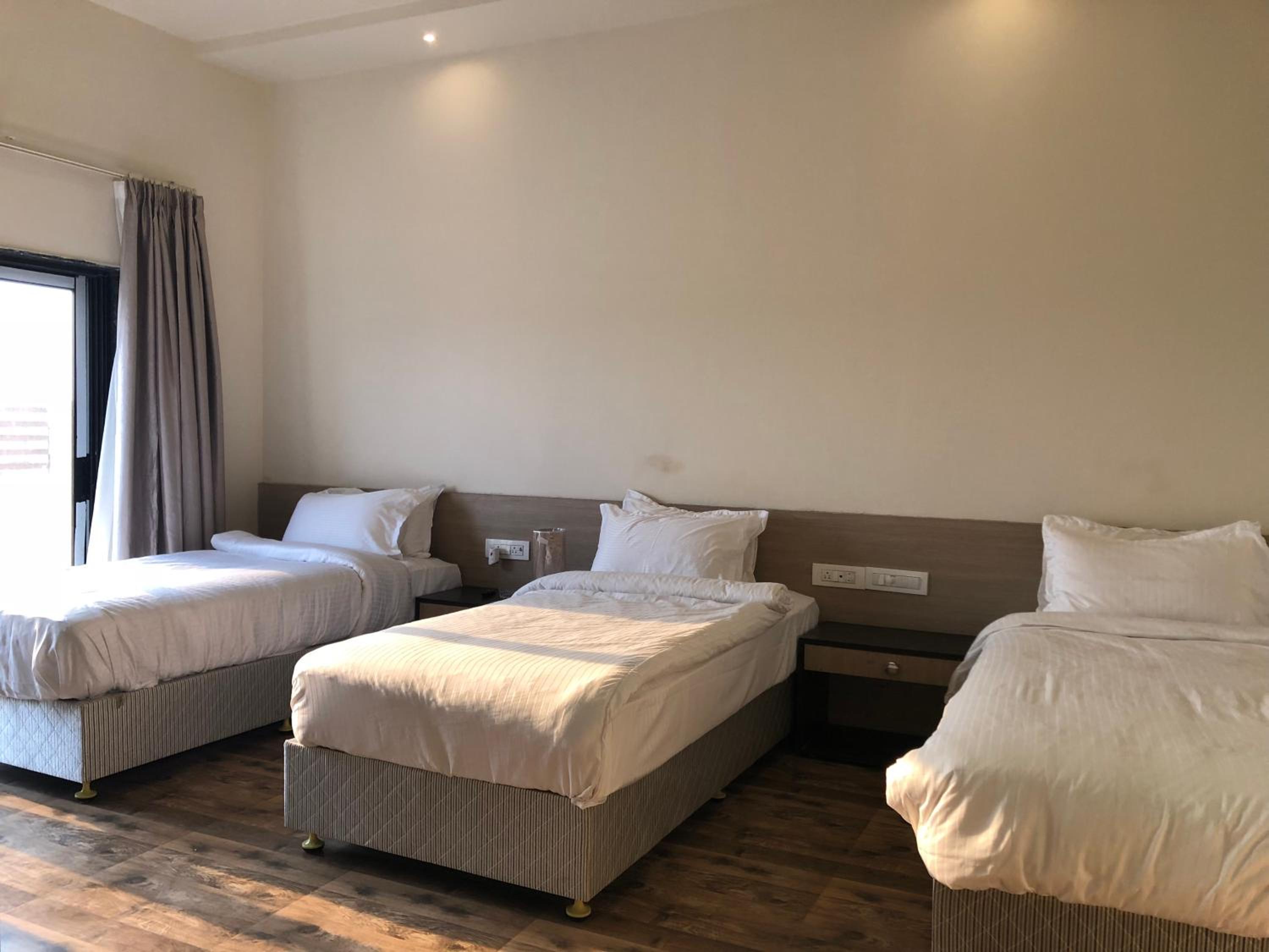 Budget Triple Room - Photo 1