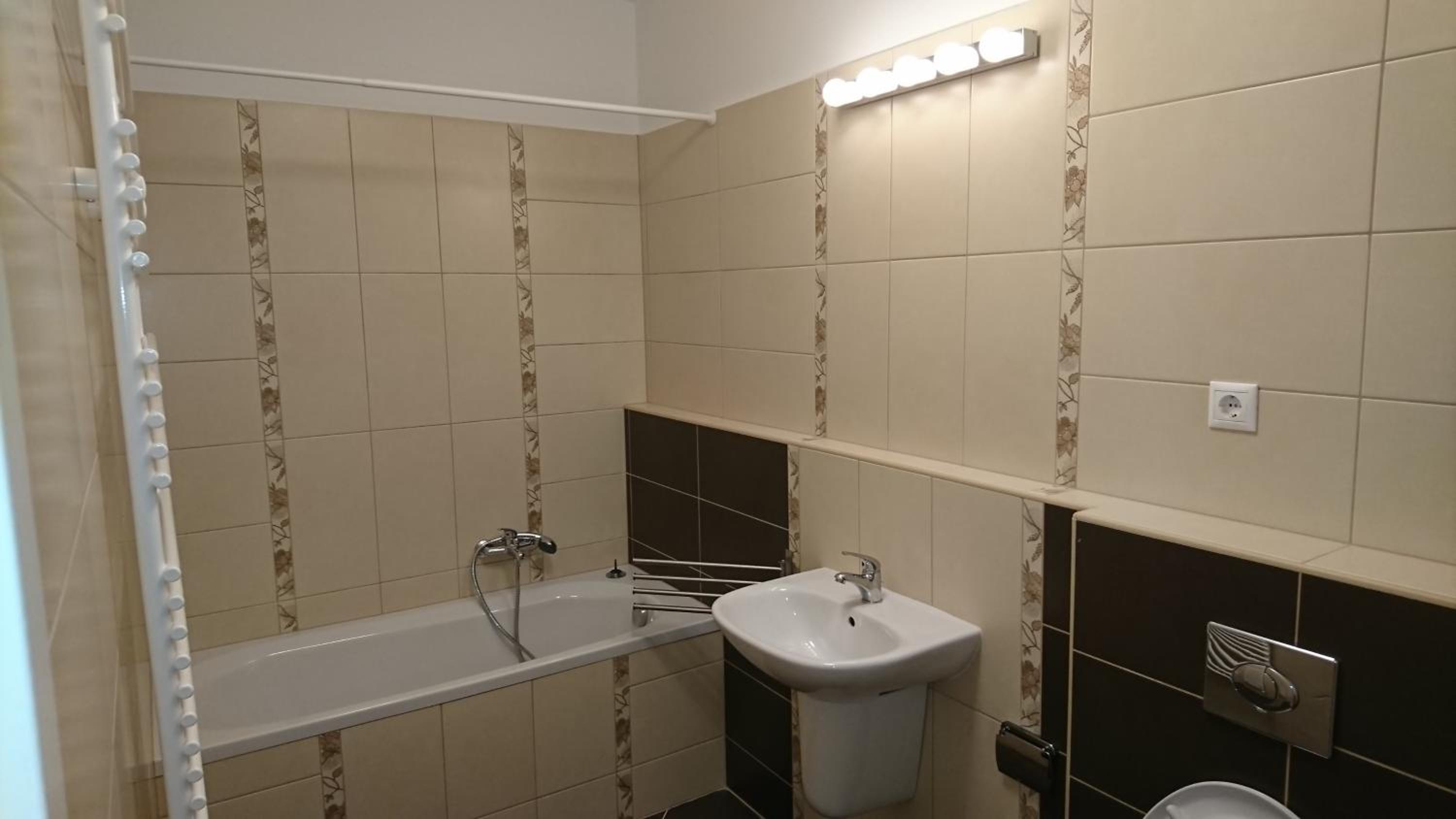 Three-Bedroom Apartment - Photo 13