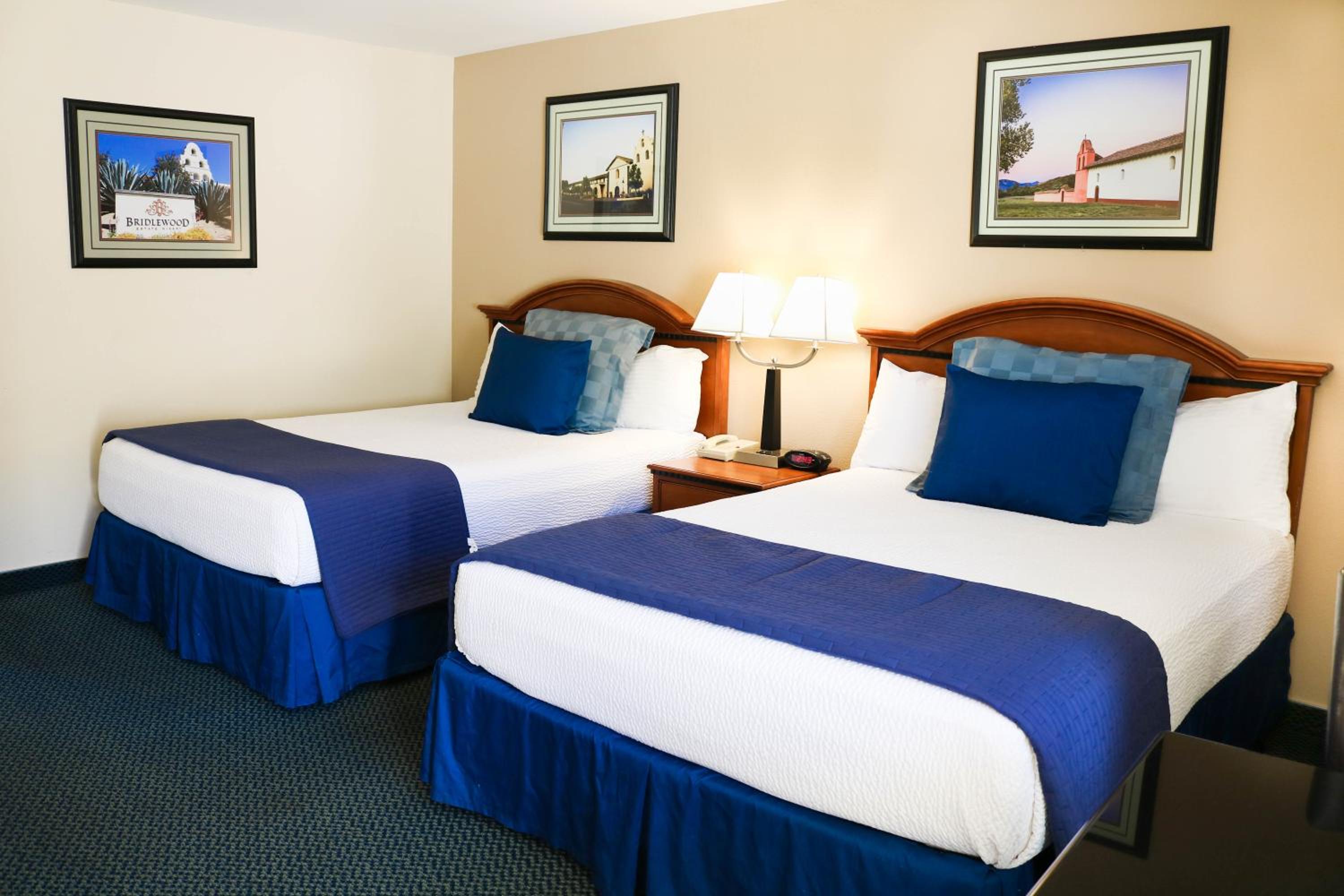 Deluxe Queen Room with Two Queen Beds Upstairs - Photo 1