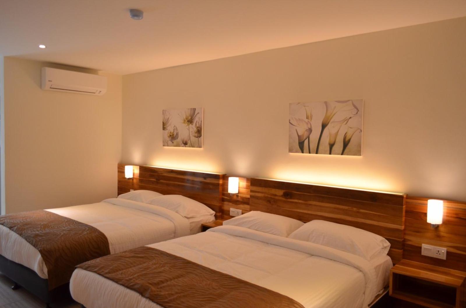 Deluxe Queen Room with Two Queen Beds photo 2