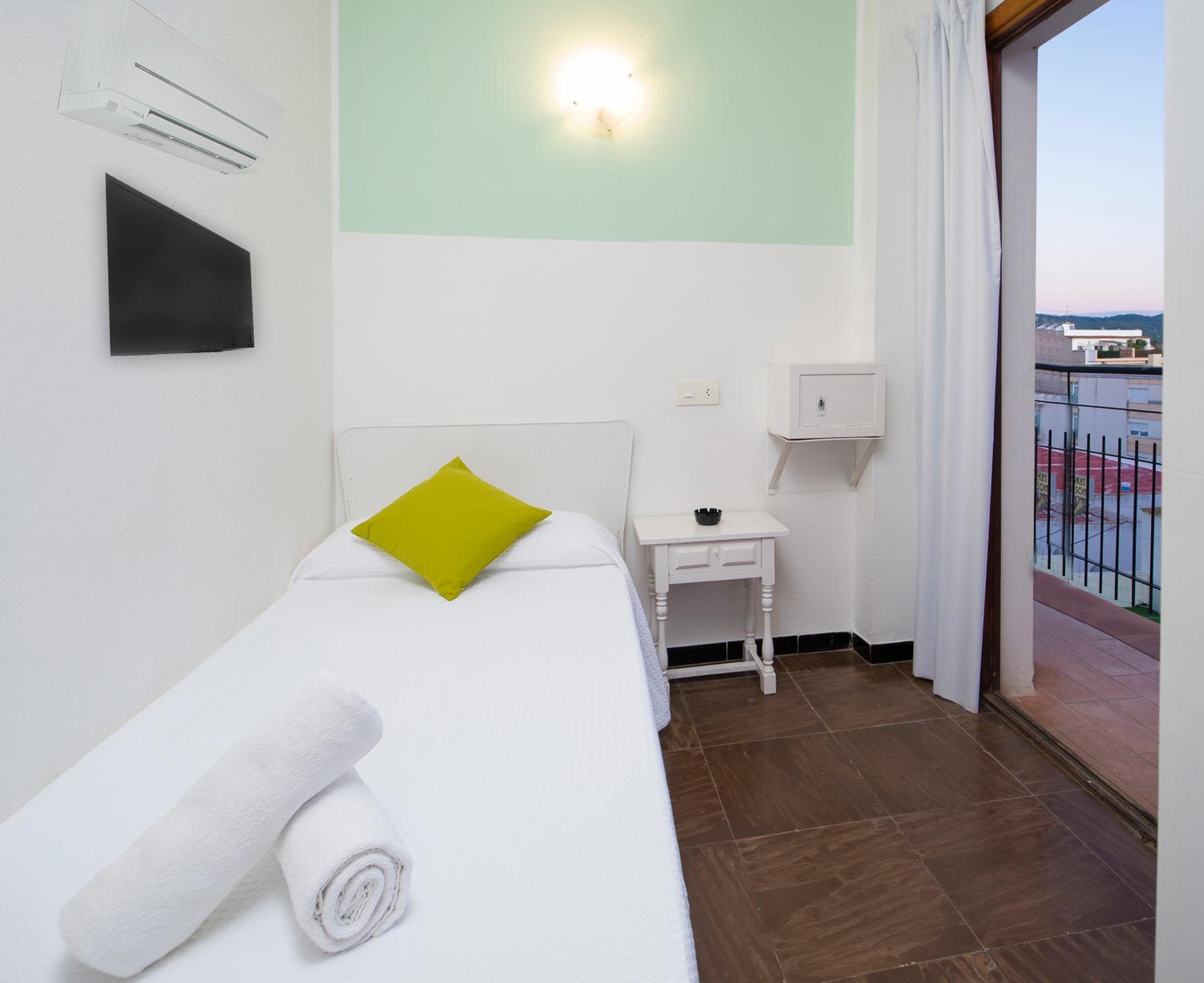 Habitación Sencilla con aire acondicionado y balcón