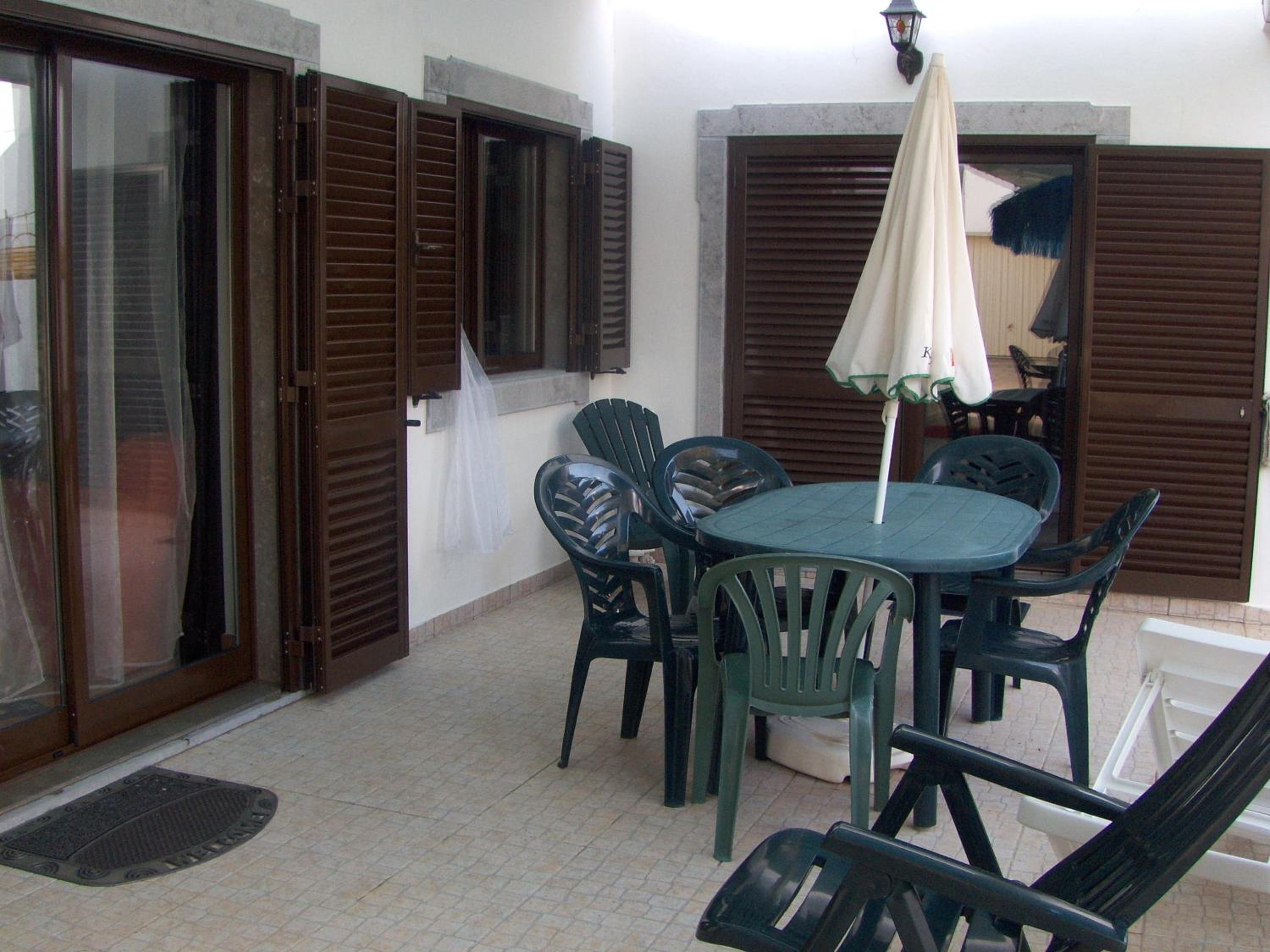 Three-Bedroom House - Photo 24