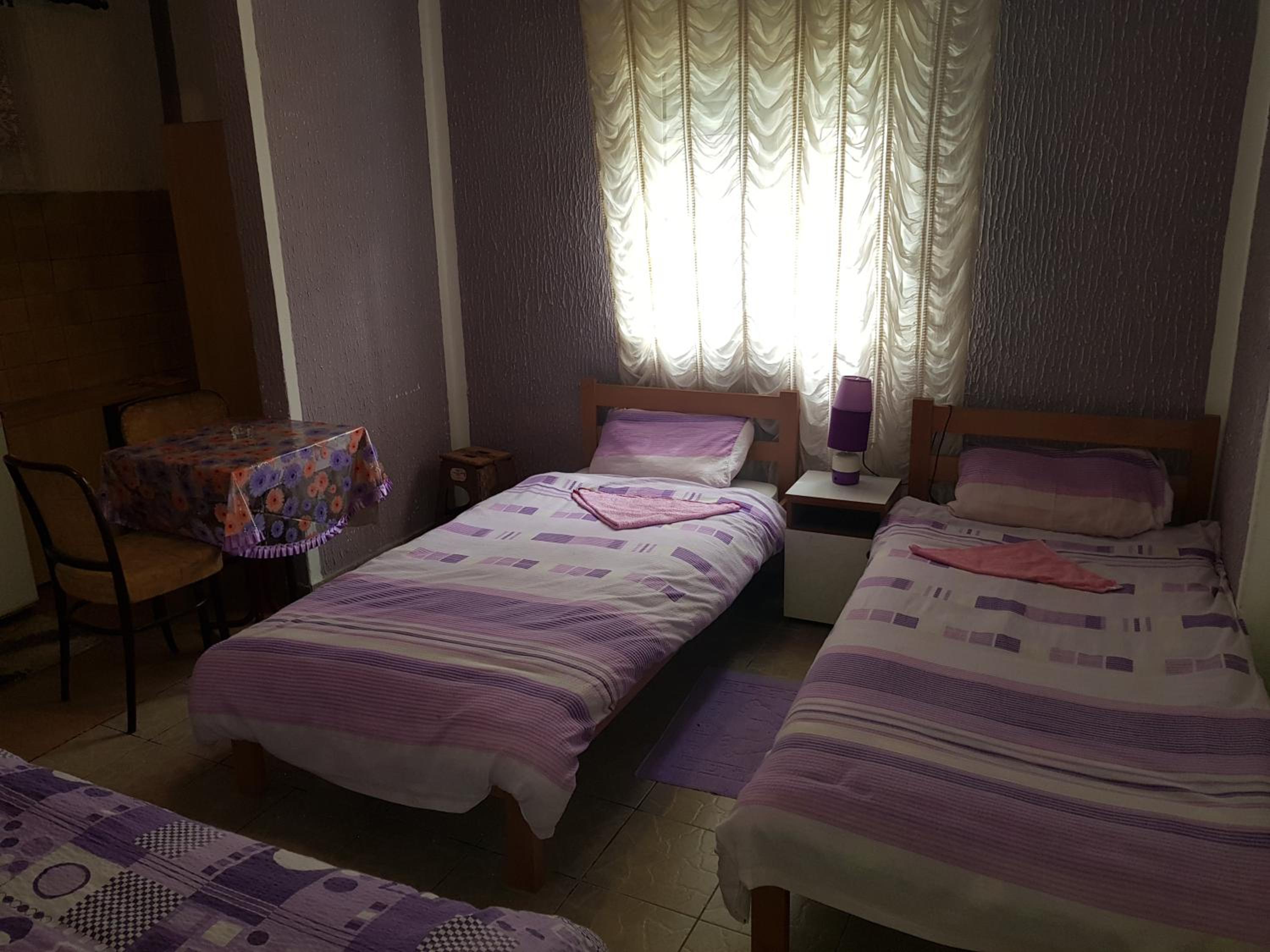 Basic Triple Room with Private Bathroom photo 1