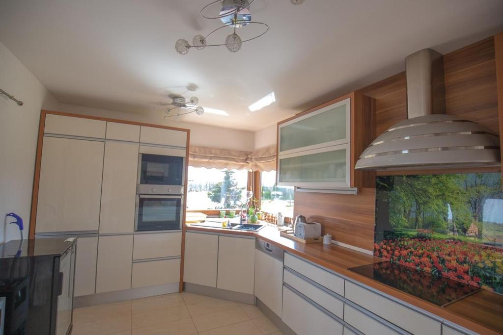 Three-Bedroom House - Photo 47