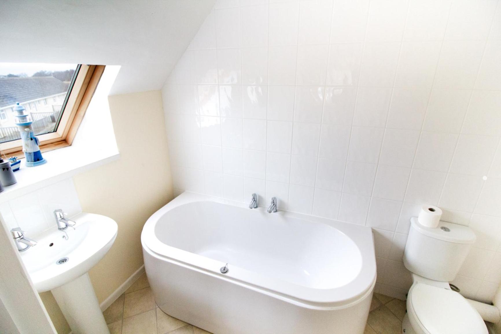 Three-Bedroom House - Photo 11