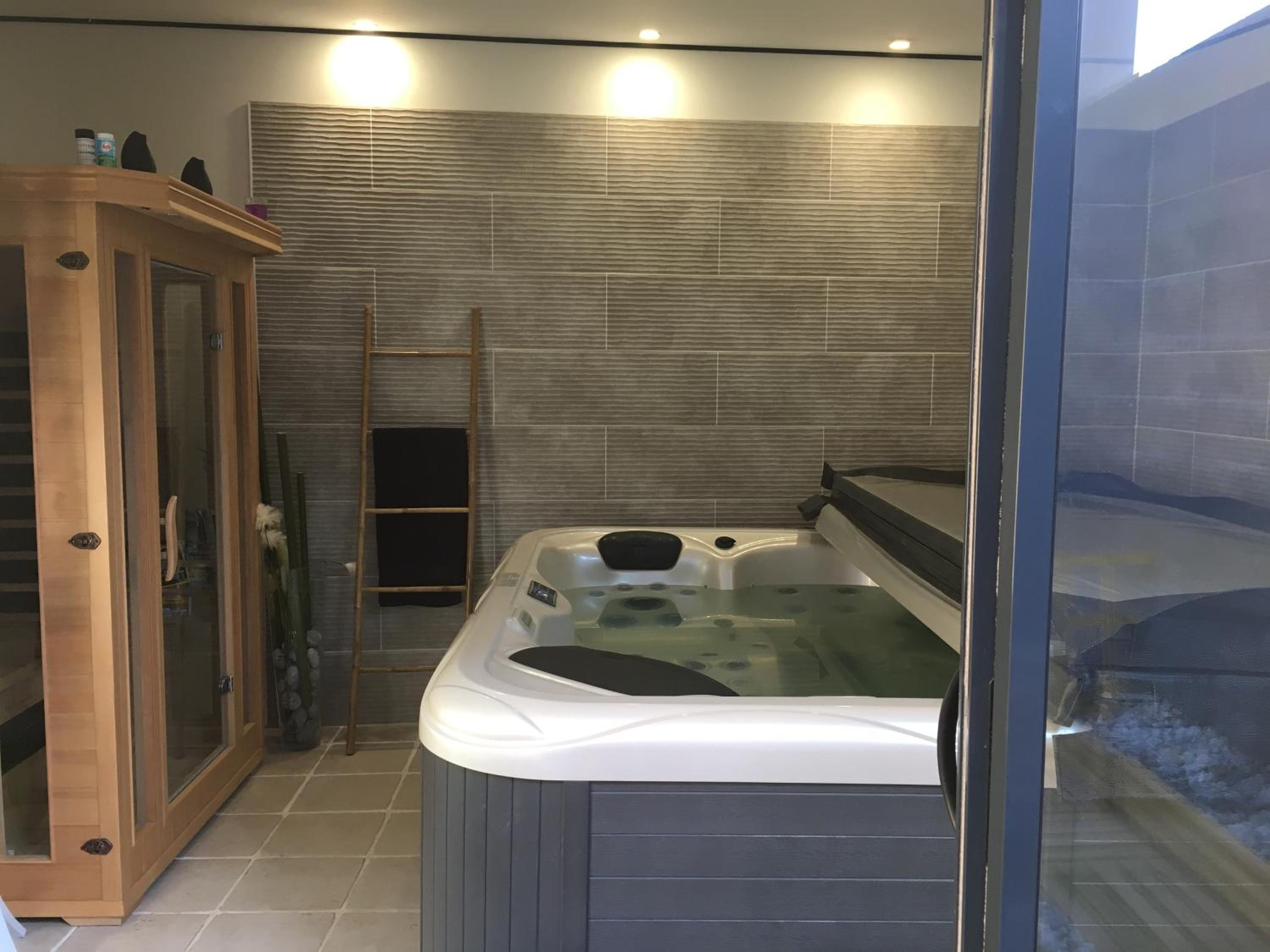 Suite with Private Hot Tub - Photo 25