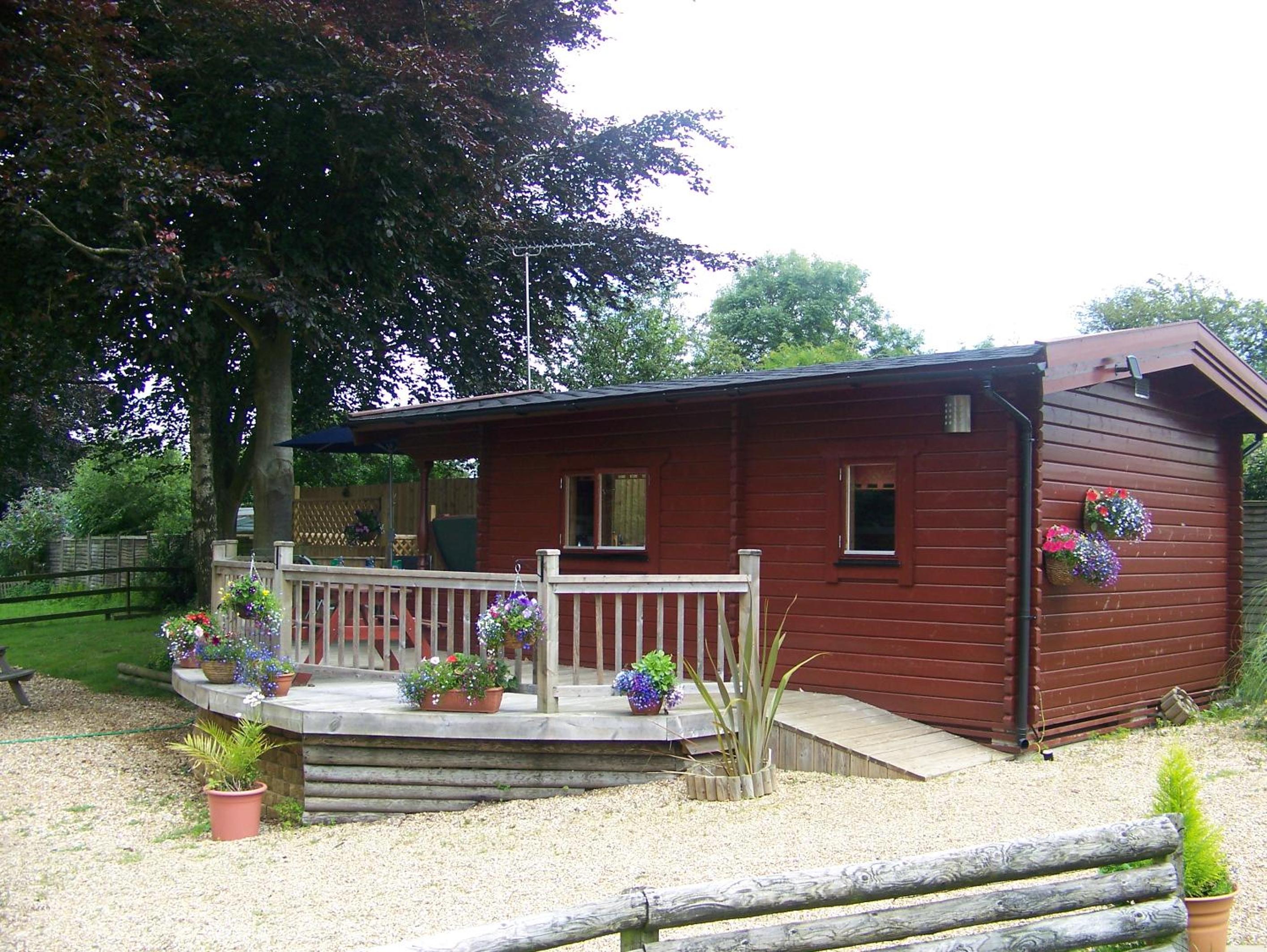 Log Cabin with Hot Tub (2 Adults) photo 3