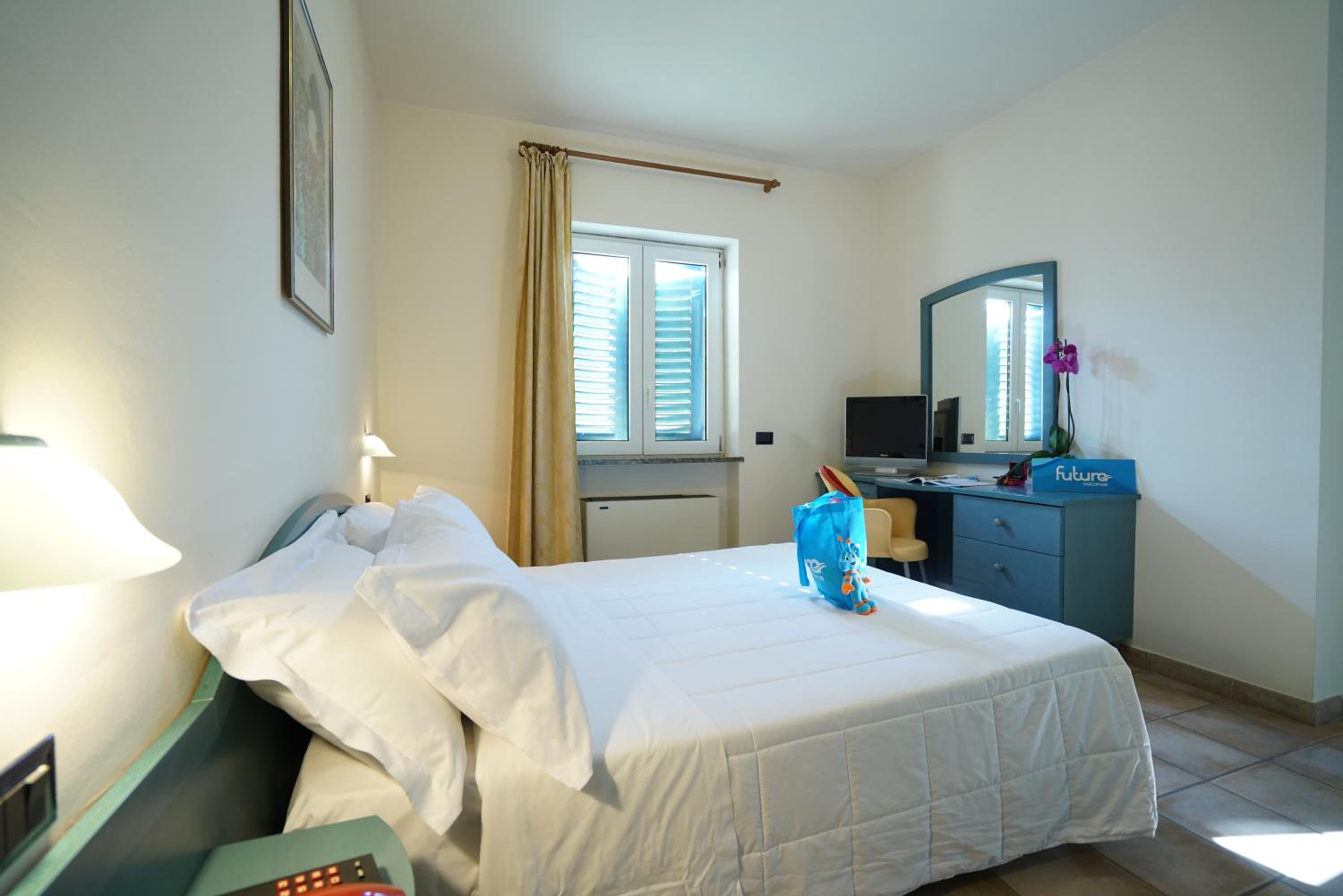 Quadruple Room with Balcony photo 3