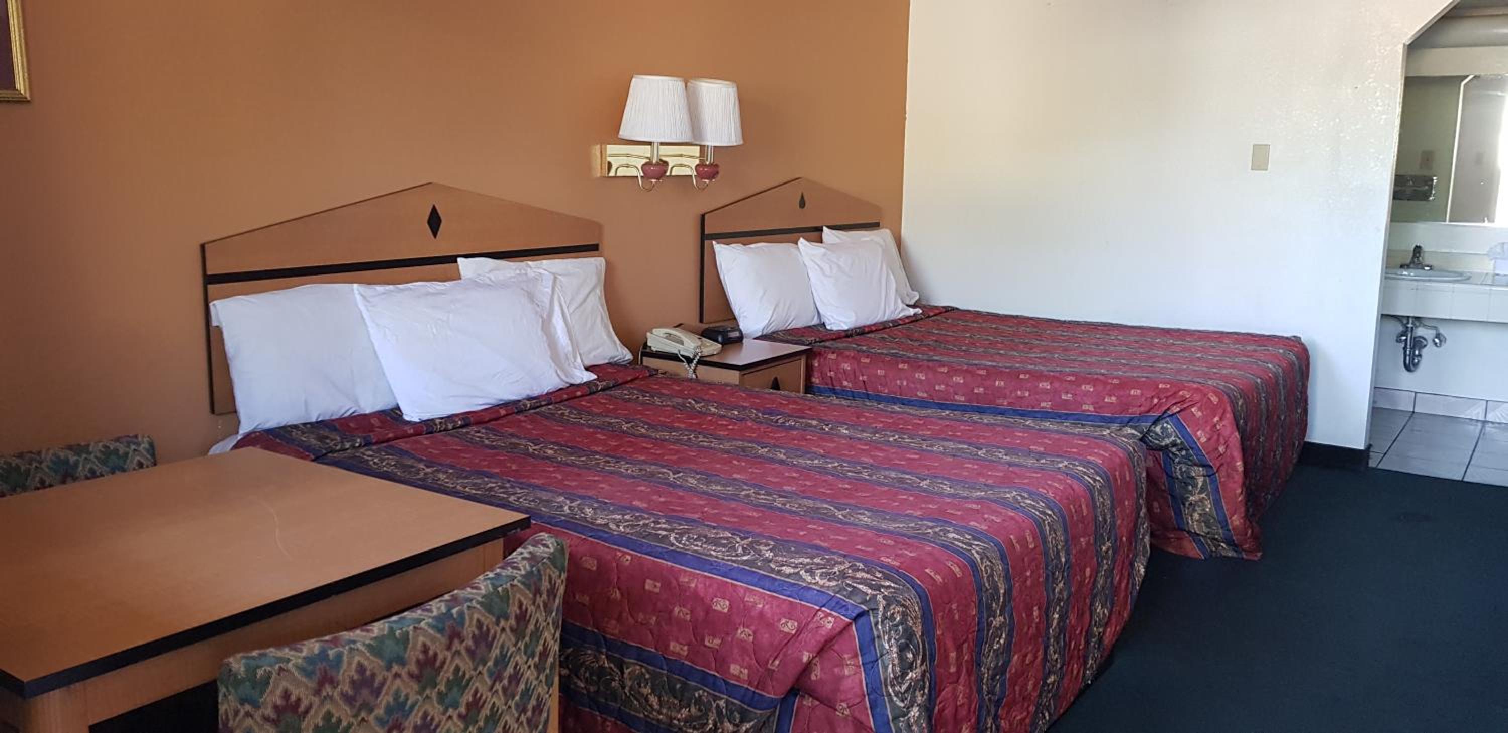 Deluxe Business Queen Room with Two Queen Beds - Non-Smoking photo 1