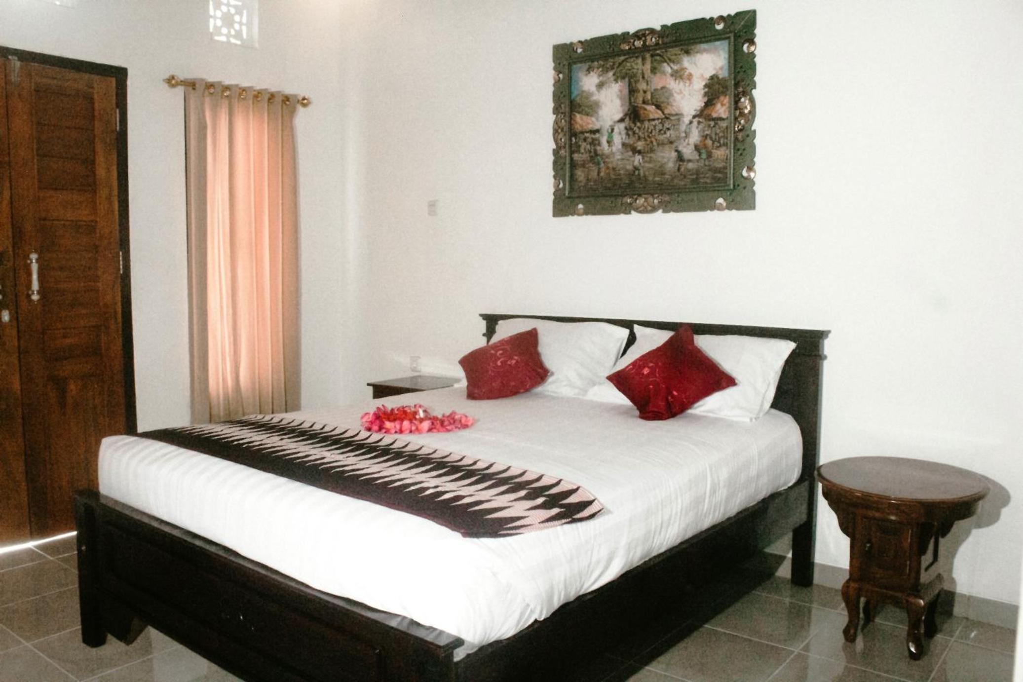 Deluxe Double Room (2 Adults + 1 Child) - Photo 7