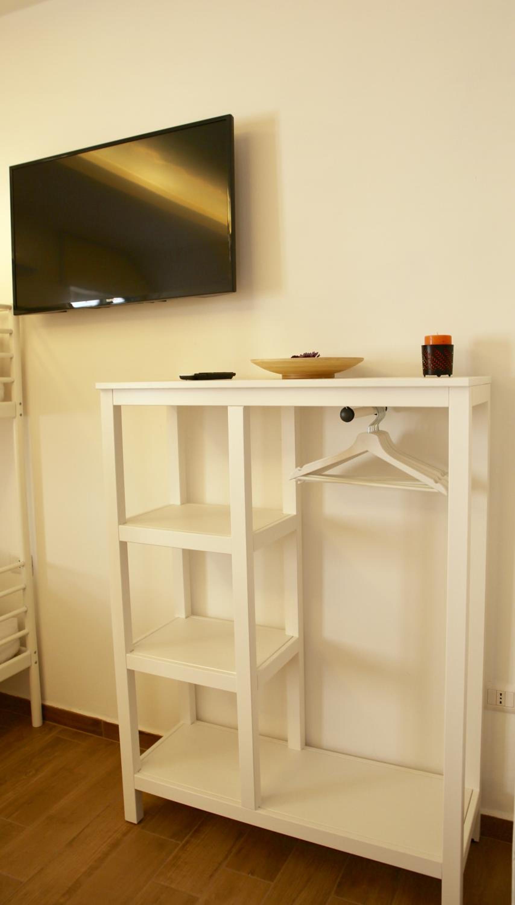 Deluxe Family Suite - Photo 15