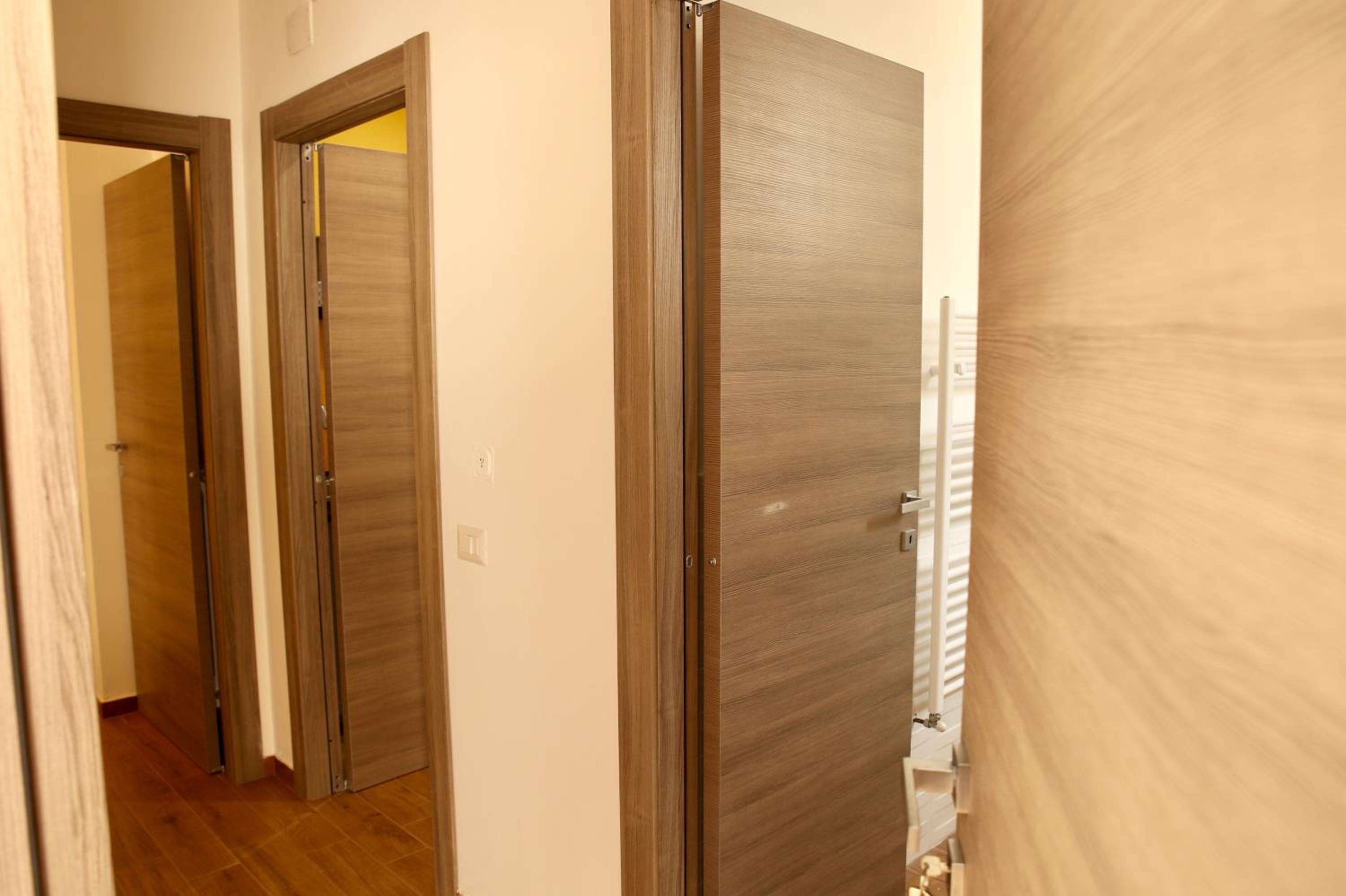 Deluxe Family Suite - Photo 17