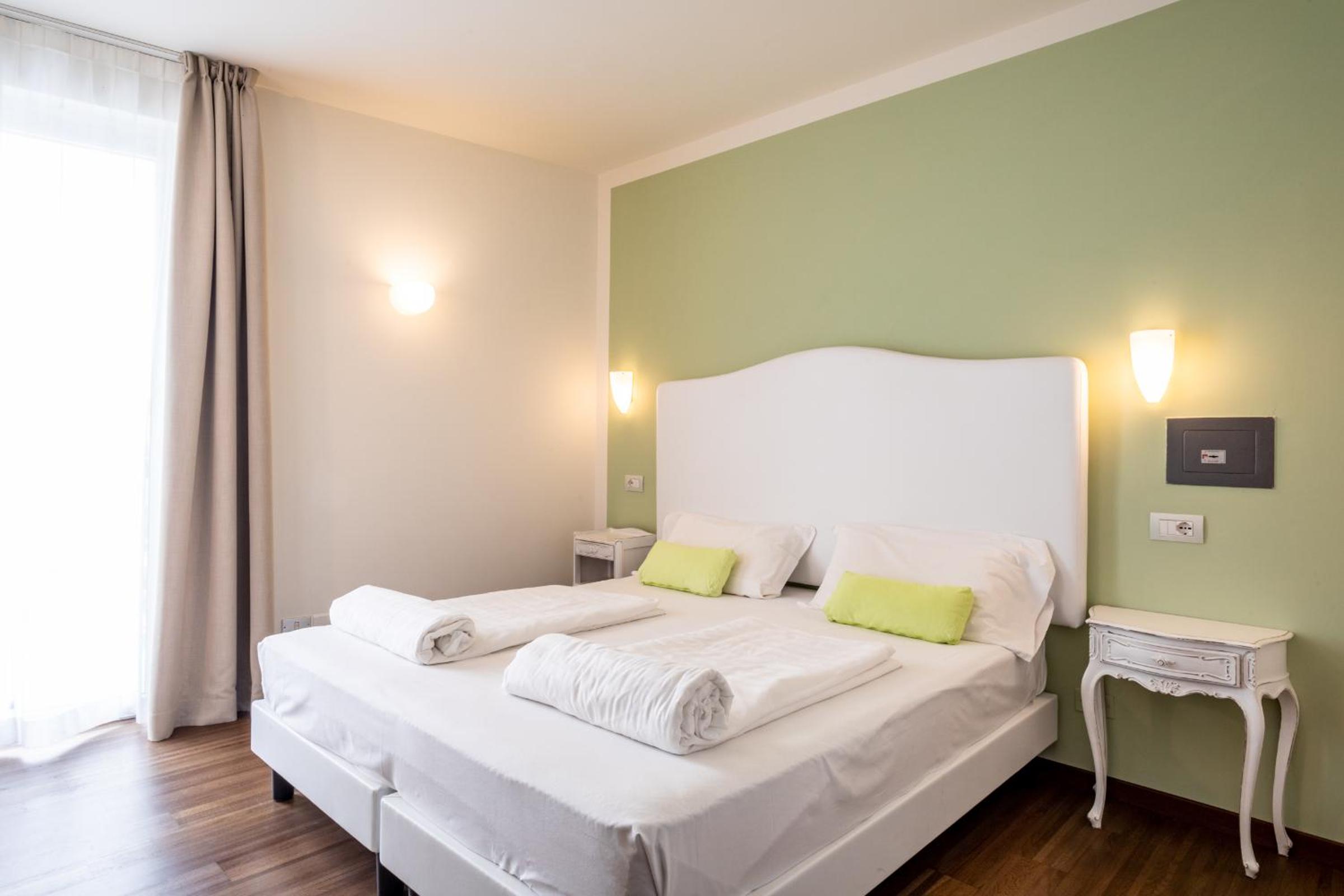 Double or Twin Room with Balcony and Garden View