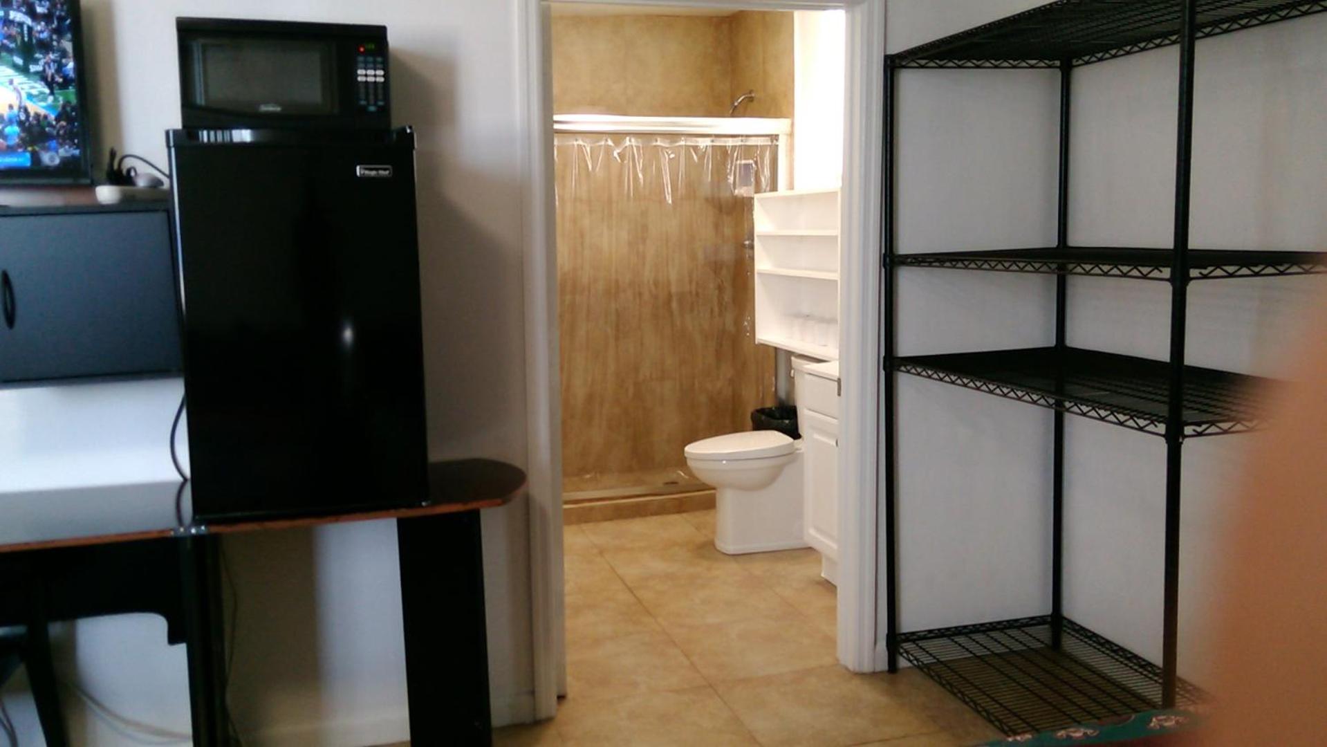 Quadruple Room with Private Bathroom photo 1