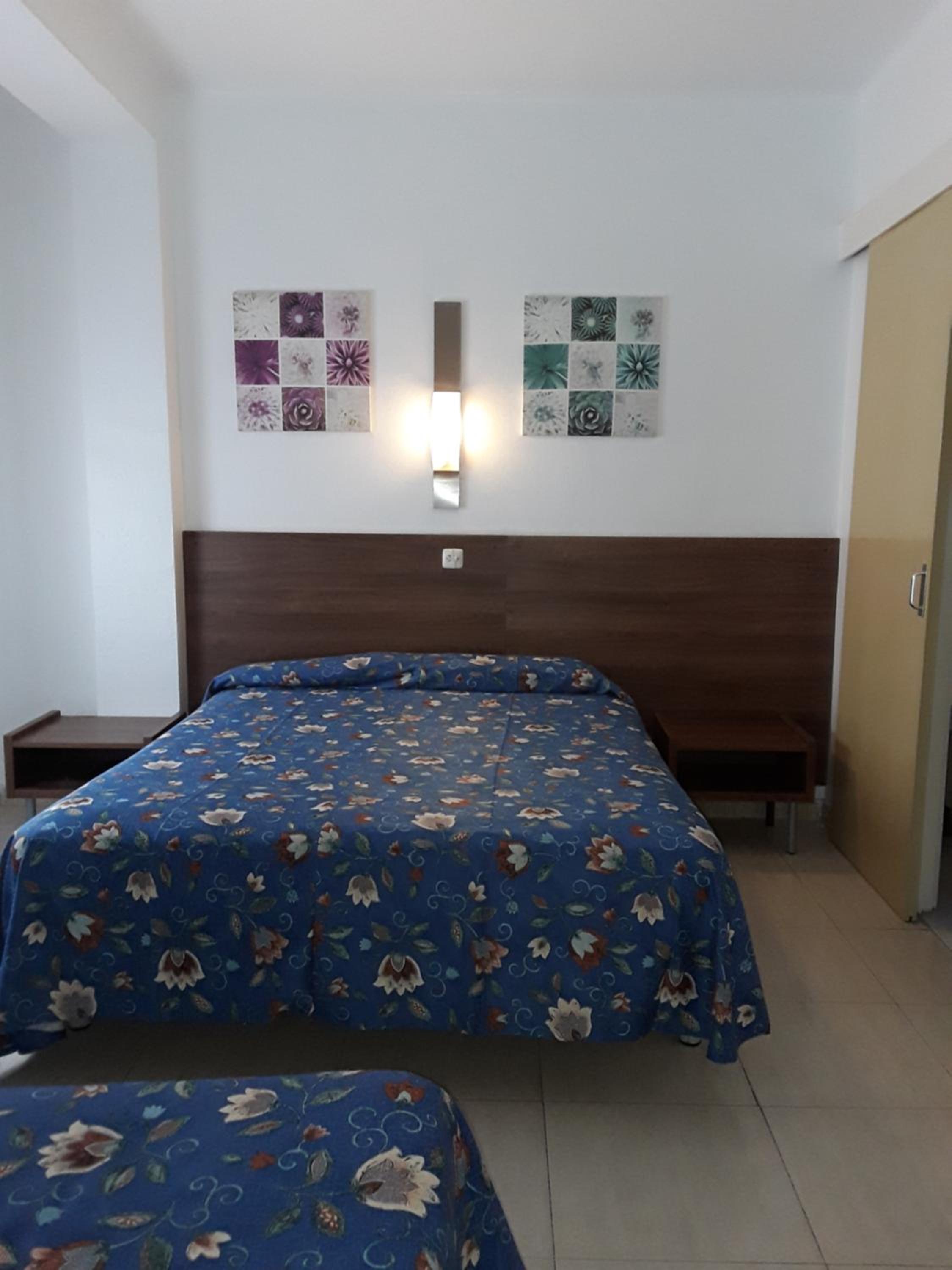 Habitación Triple con Baño Privado