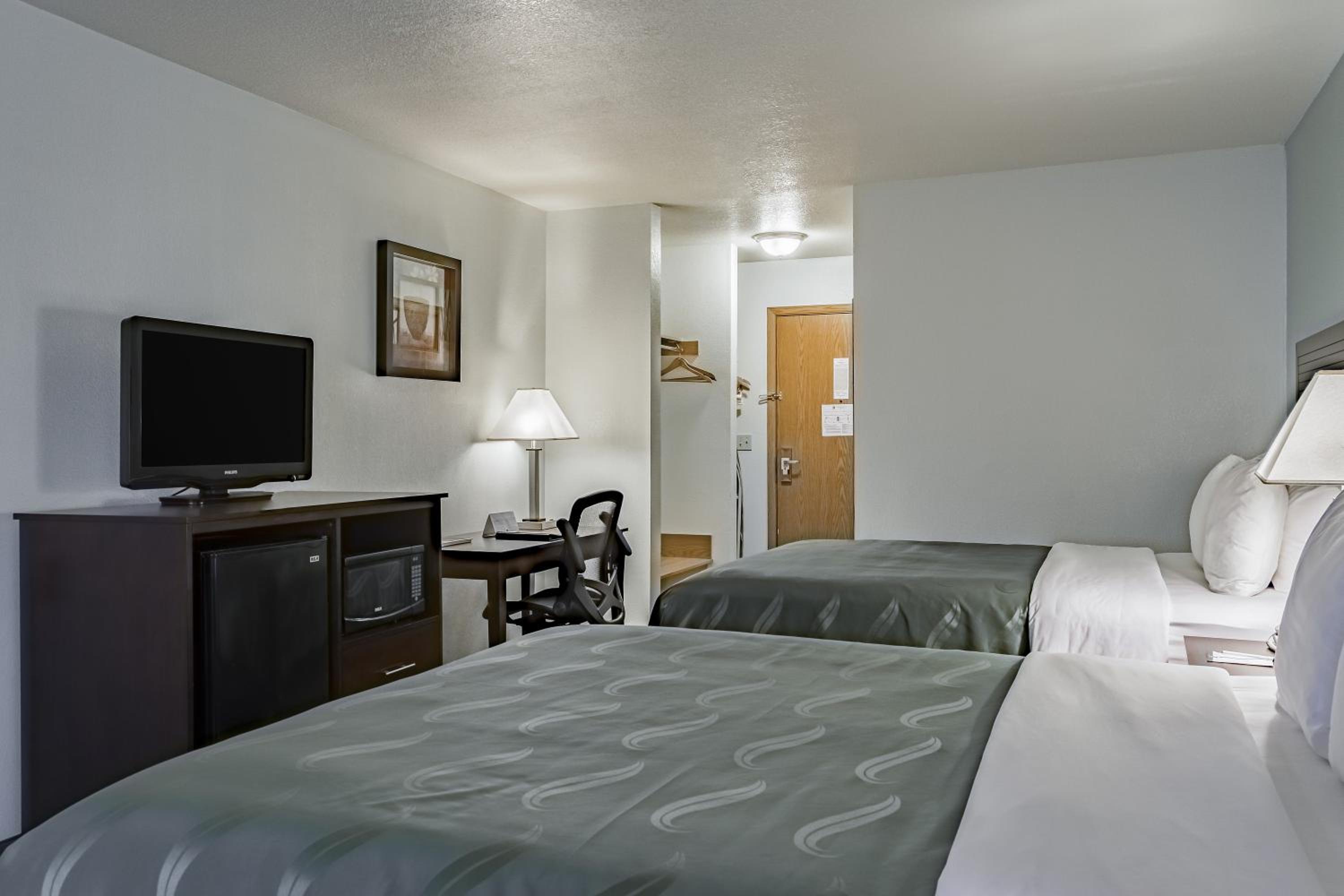 Queen Room with Two Queen Beds - Non-Smoking - Photo 1