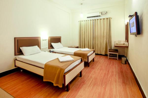Standard Twin Room - Photo 4