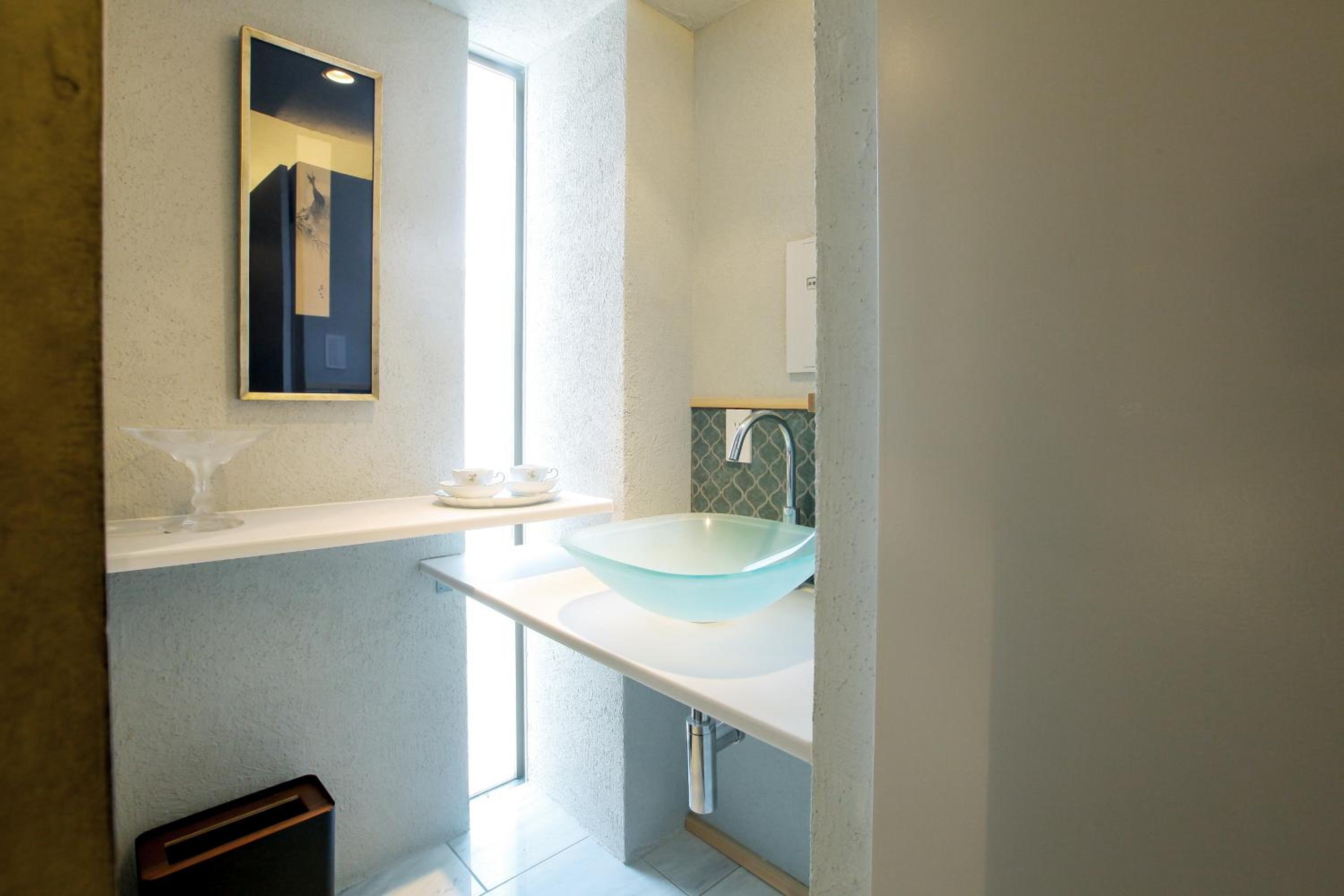 Three-Bedroom House - Photo 31