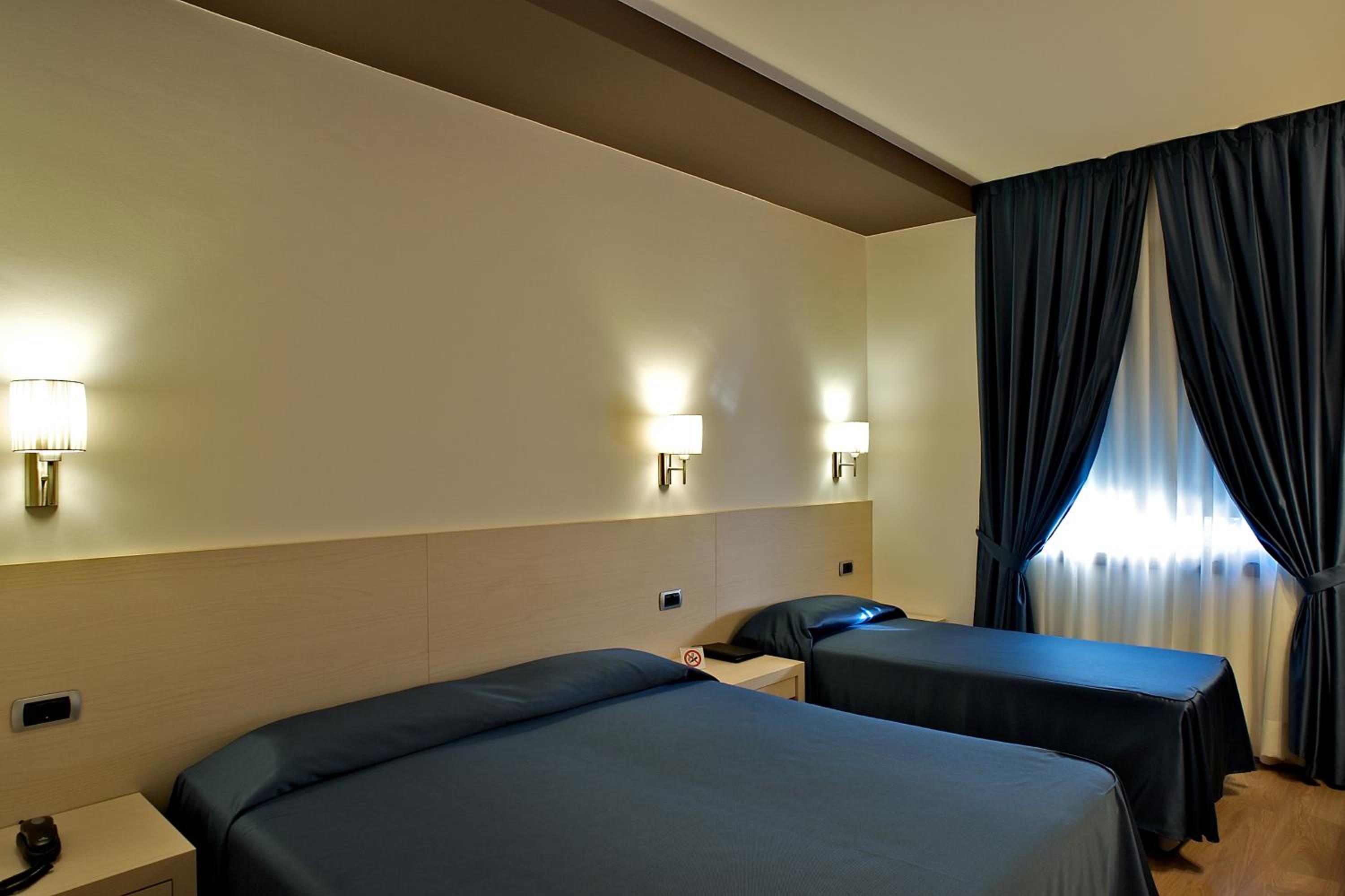 Triple Room - Photo 1