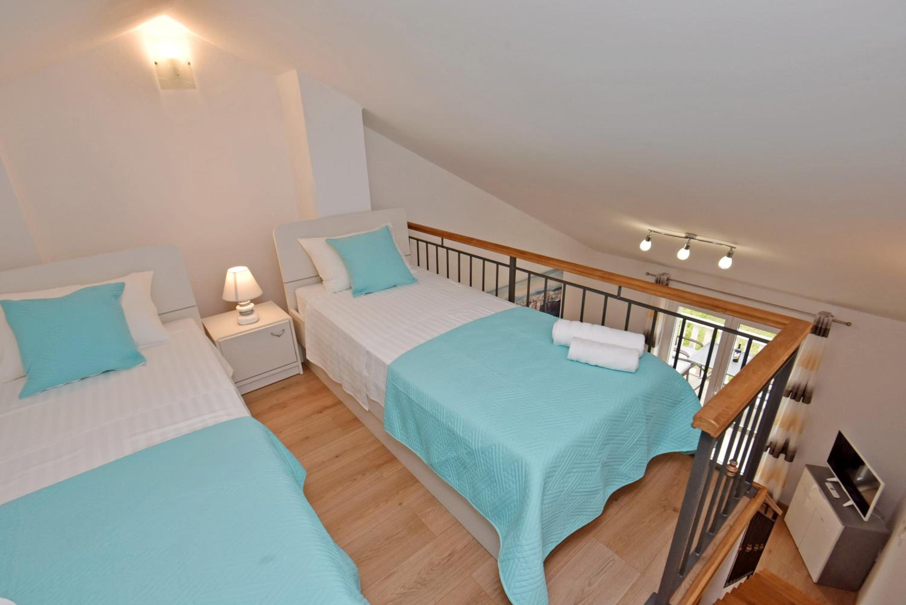Duplex One-Bedroom Apartment with Balcony photo 1