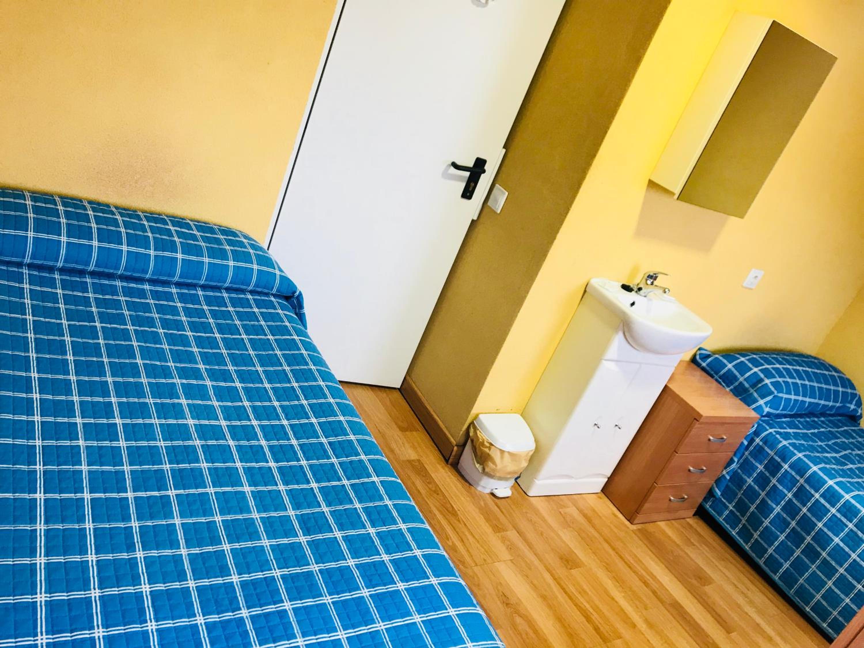 Habitación Doble con Baño Compartido