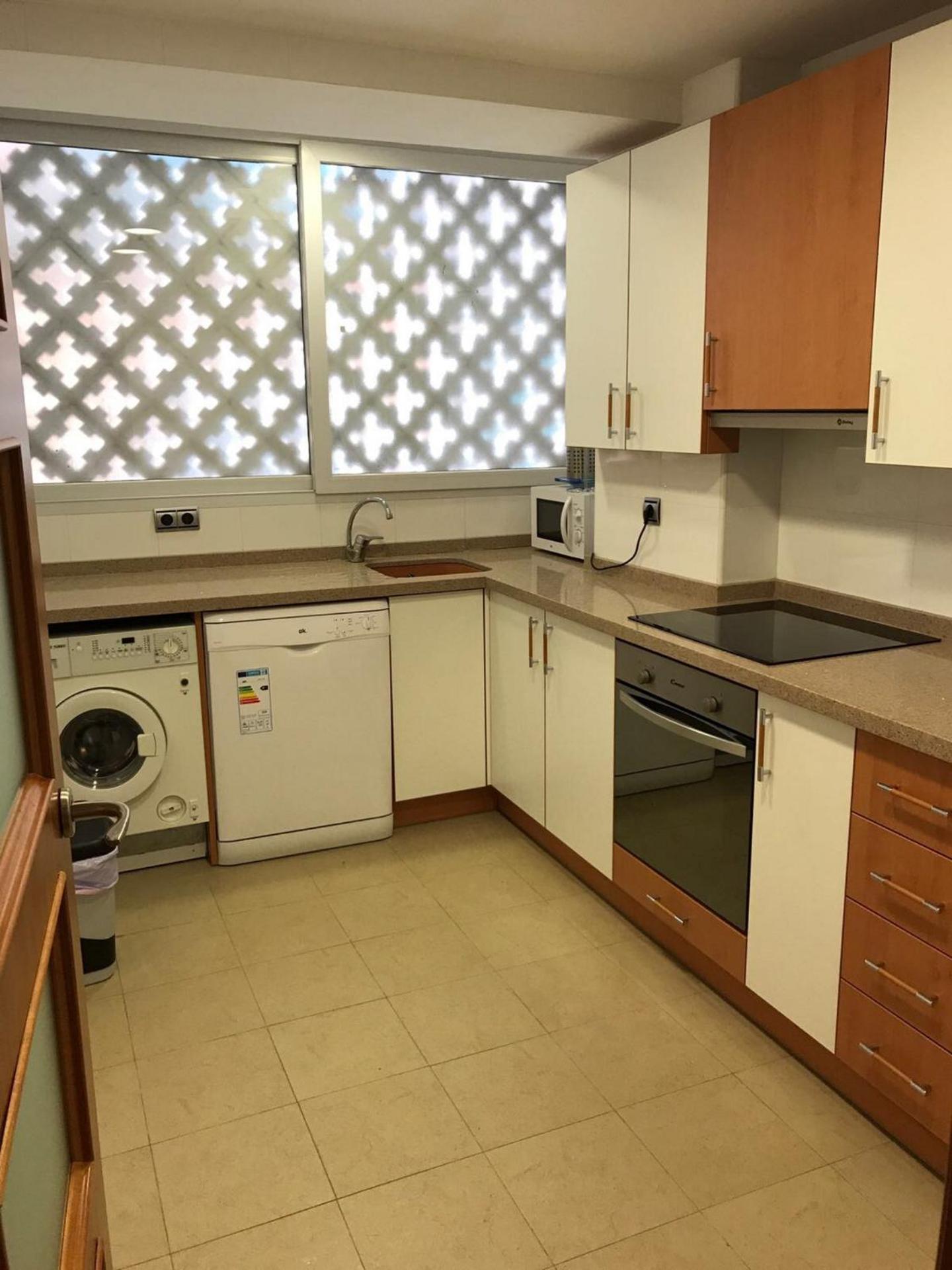 Three-Bedroom Apartment - Photo 32