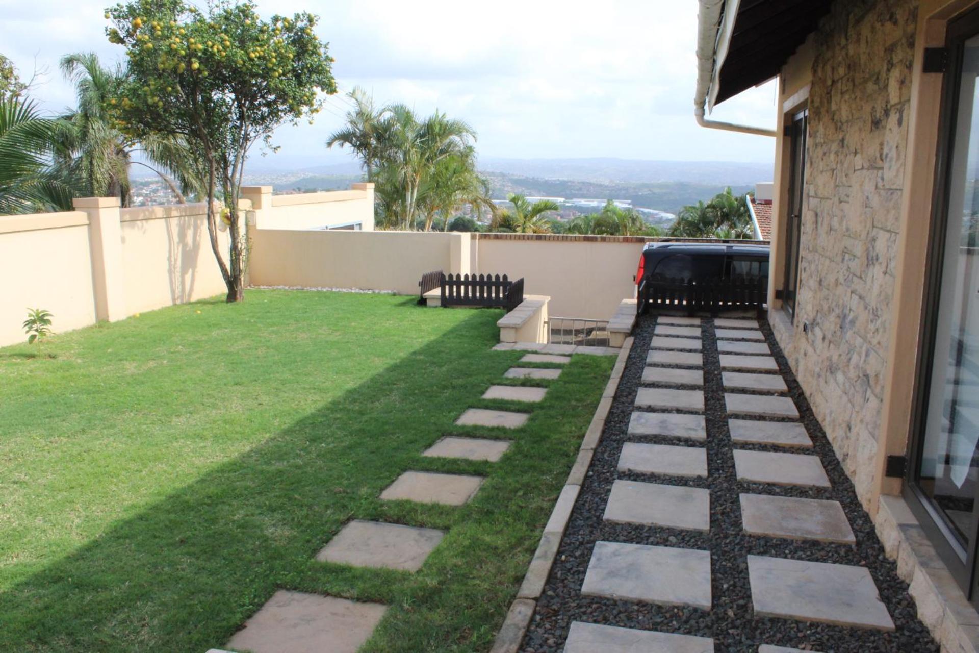 Three-Bedroom House - Photo 18