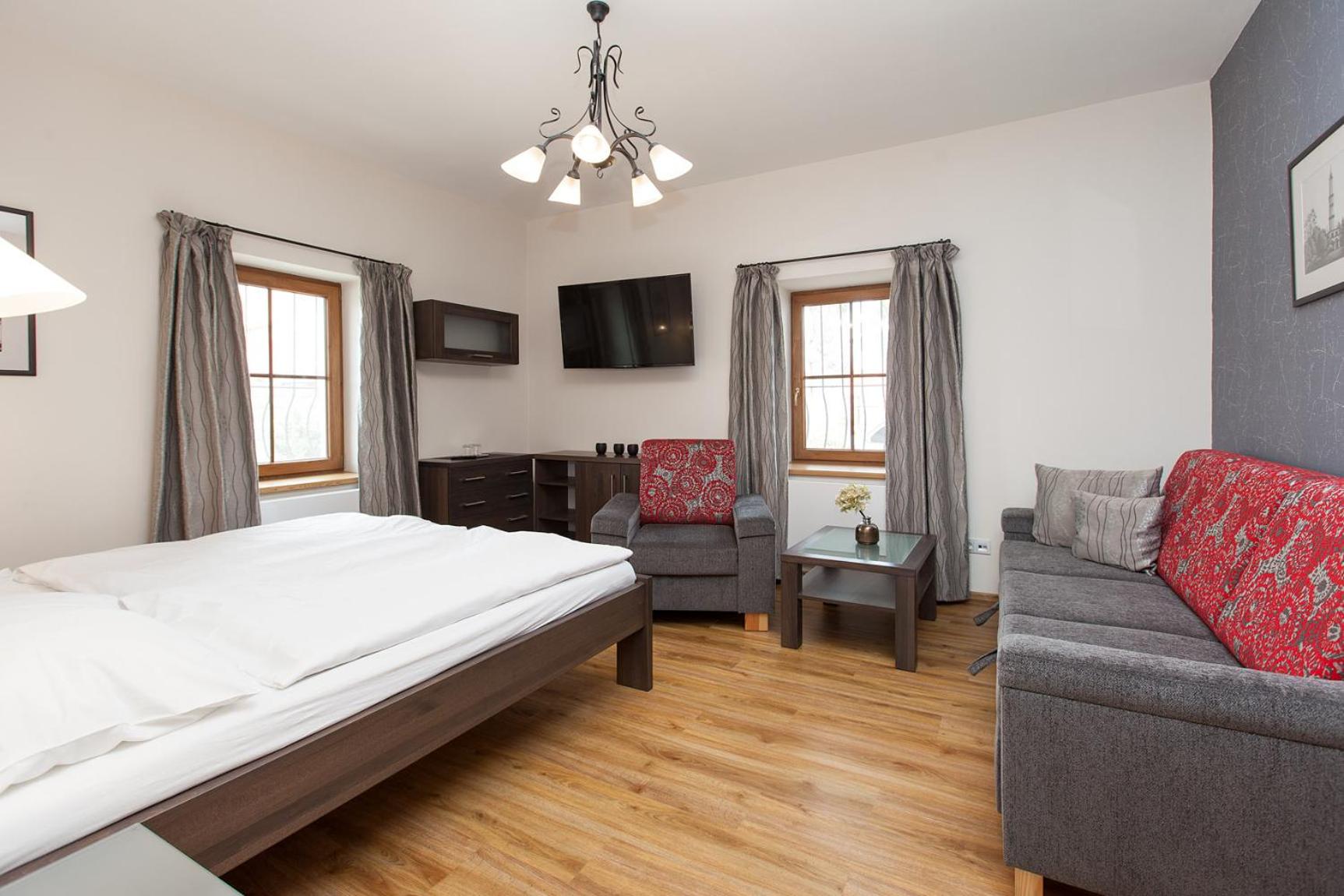 Three-Bedroom Apartment - Photo 2