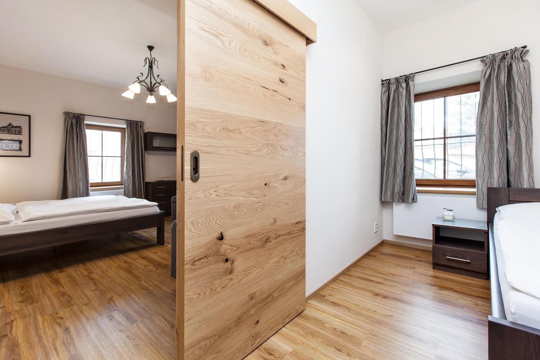Three-Bedroom Apartment - Photo 6